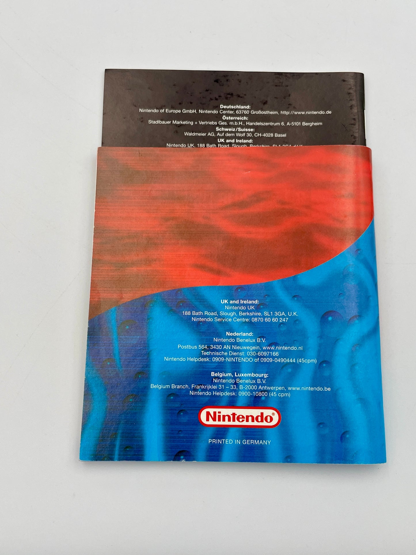 Nintendo product packaging with red and blue design on a white background