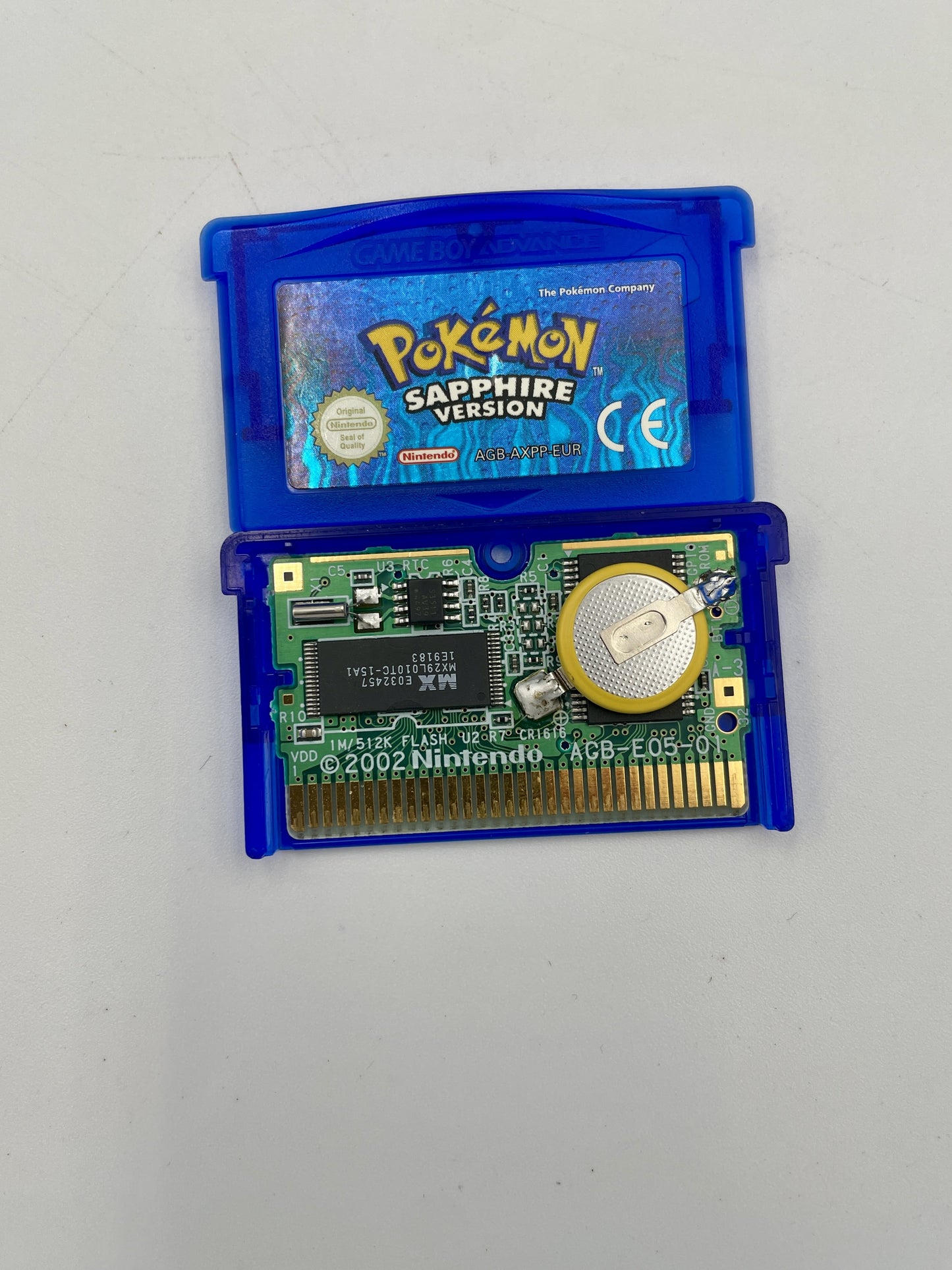 Pokémon Sapphire Version game cartridge on a white background