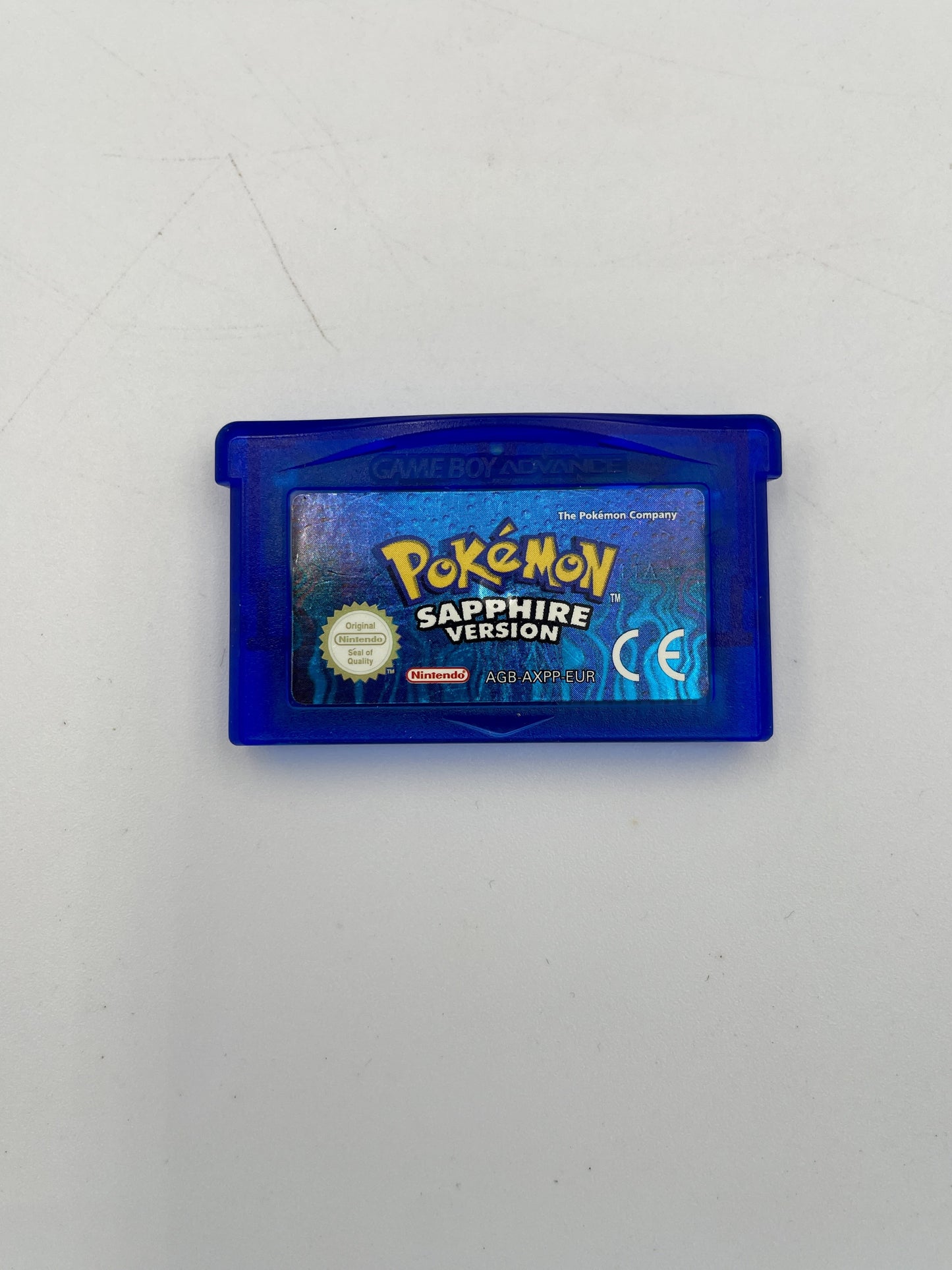 Pokémon Sapphire Version game cartridge on a white background