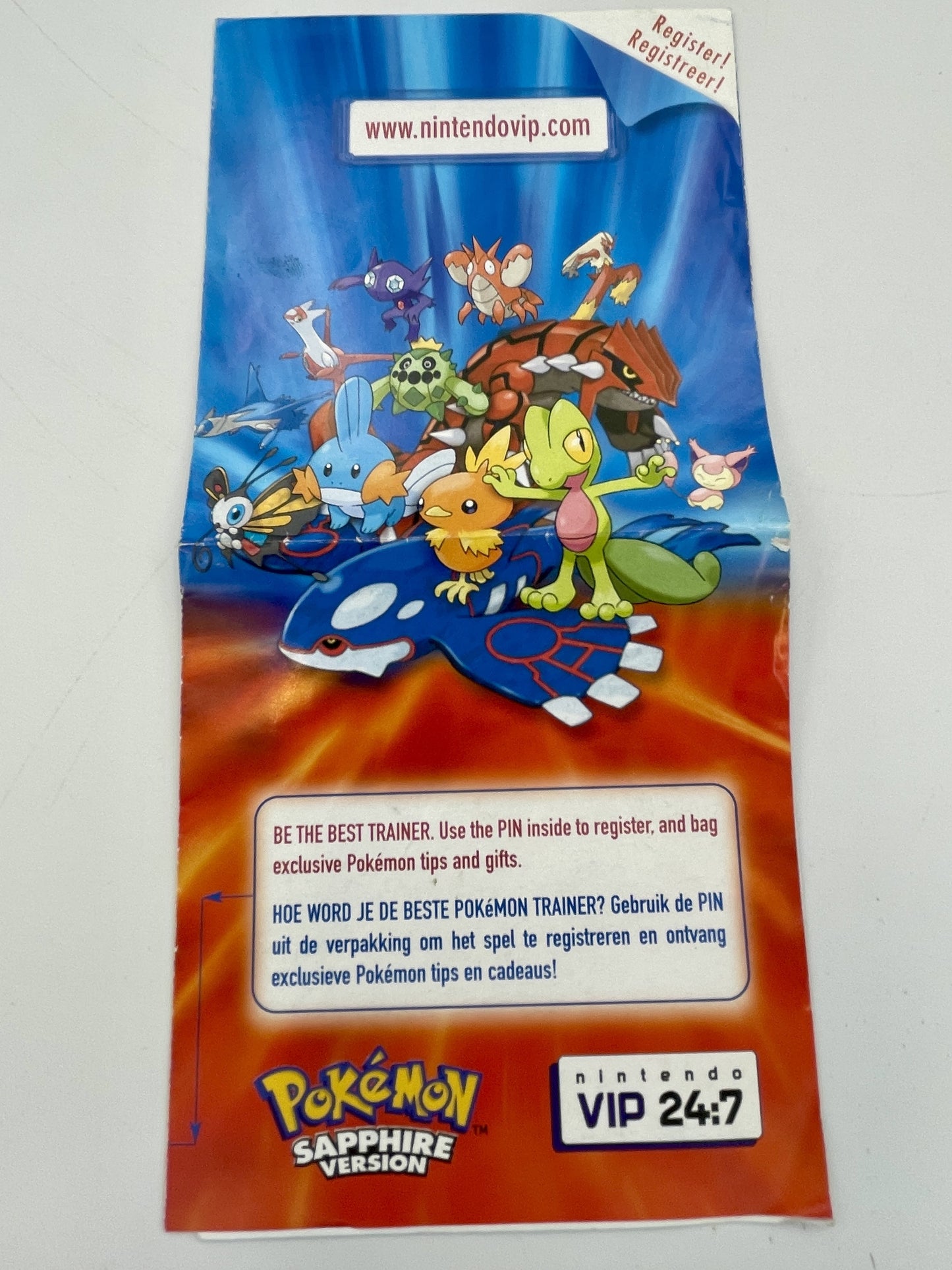 Pokémon Sapphire Version trading card with characters on a blue and orange background
