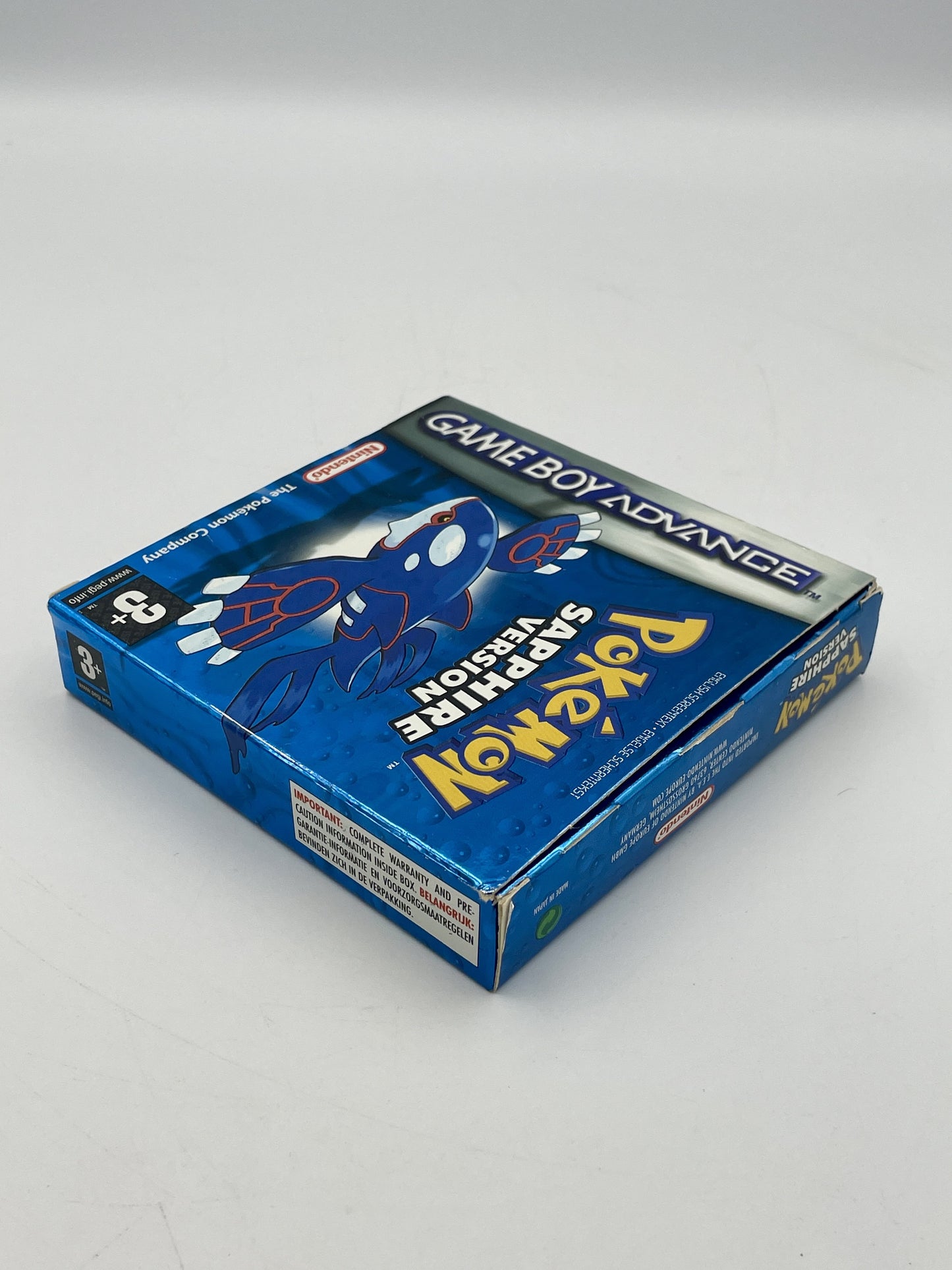 Blue Game Boy Advance Pokémon game case on a white background