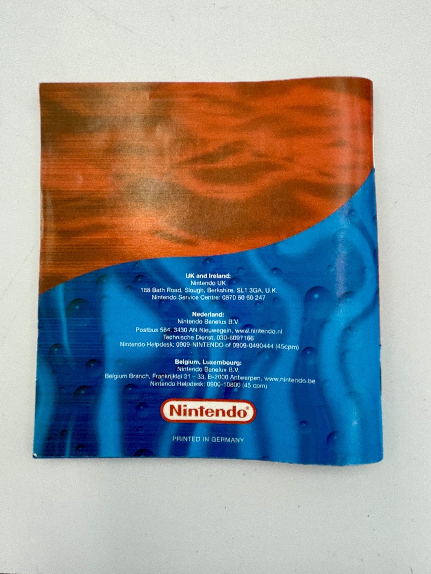 Nintendo packaging with blue and orange design on a white background