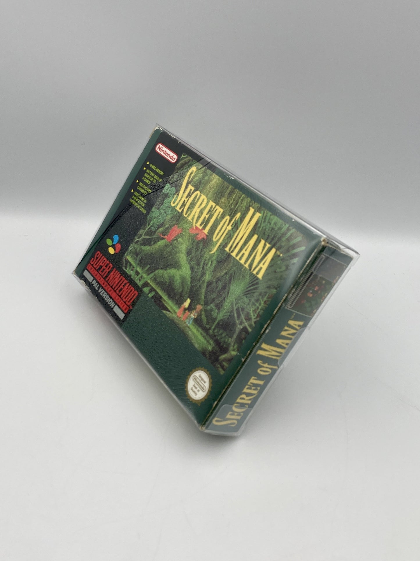 Secret of Mana game cartridge on a gray background