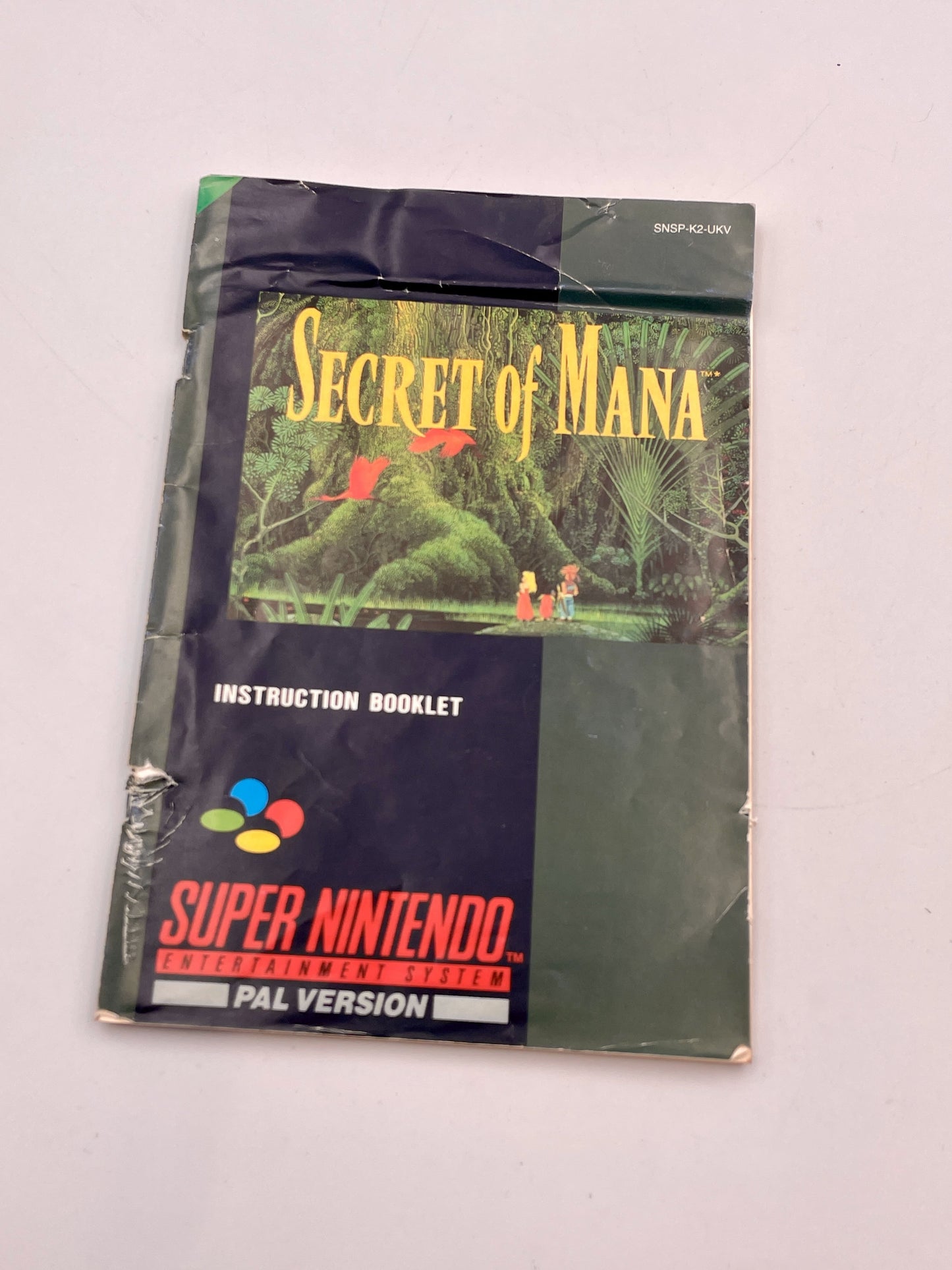 Secret of Mana Super Nintendo instruction booklet on a light gray background