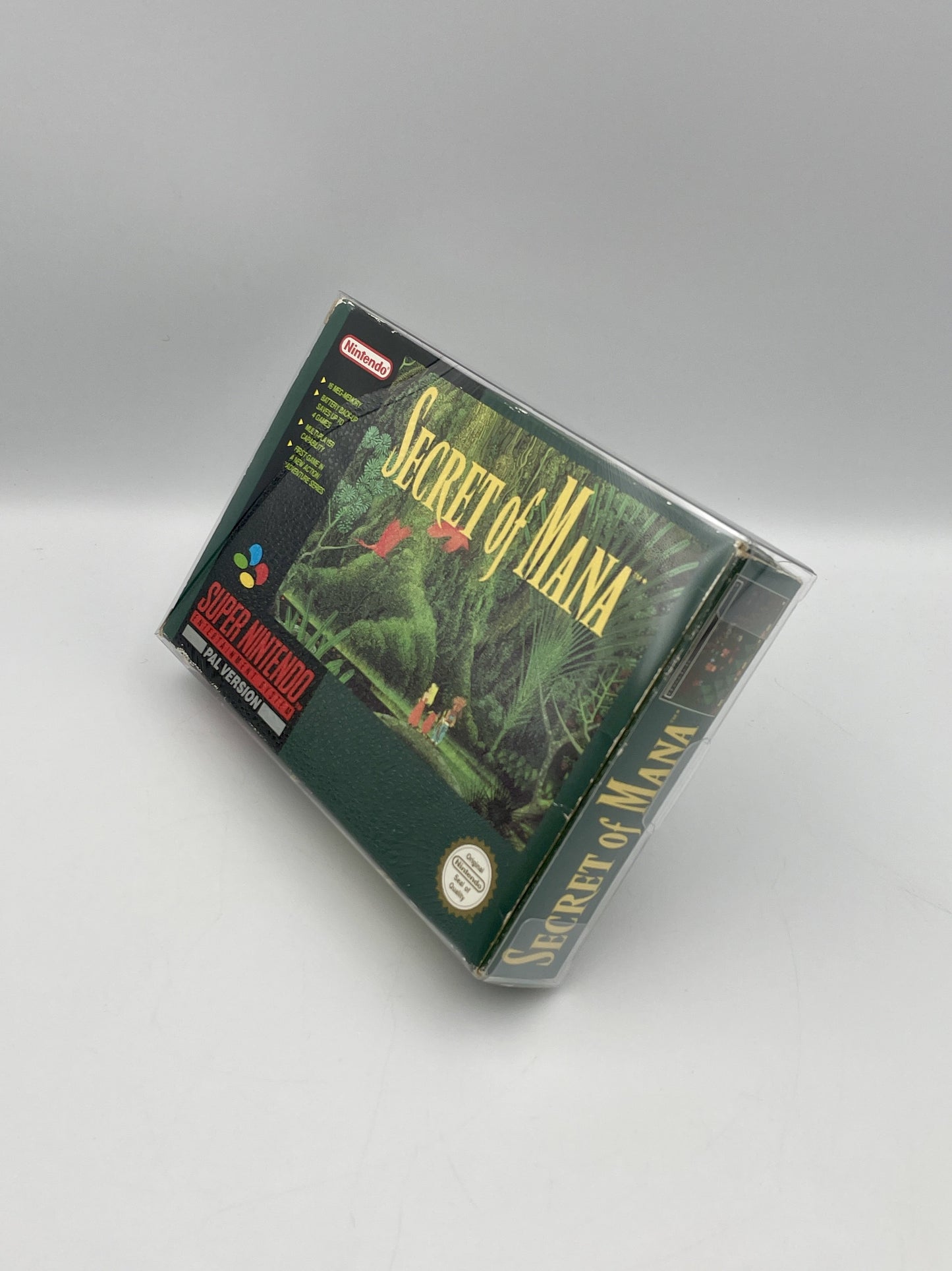 Secret of Mana game cartridge on a gray background