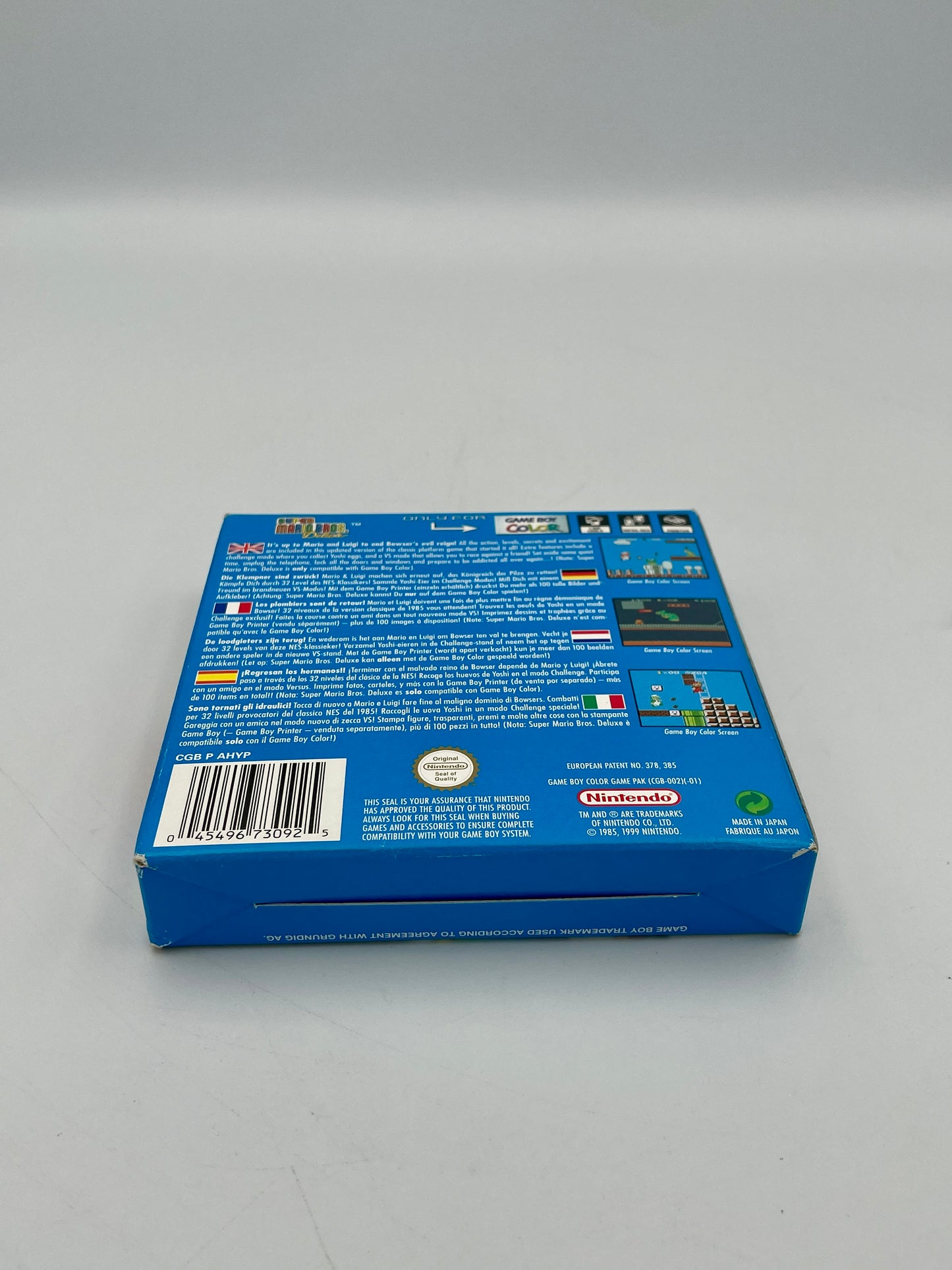 Blue box with text and a barcode on a gray background