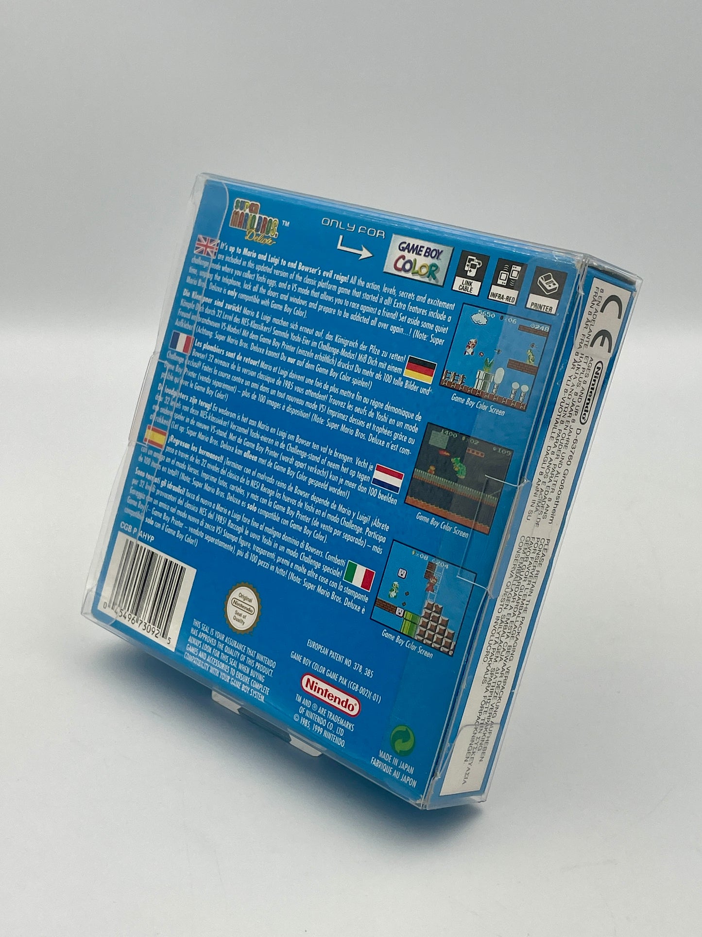 Back view of a blue game cartridge packaging with text and graphics on a gray background