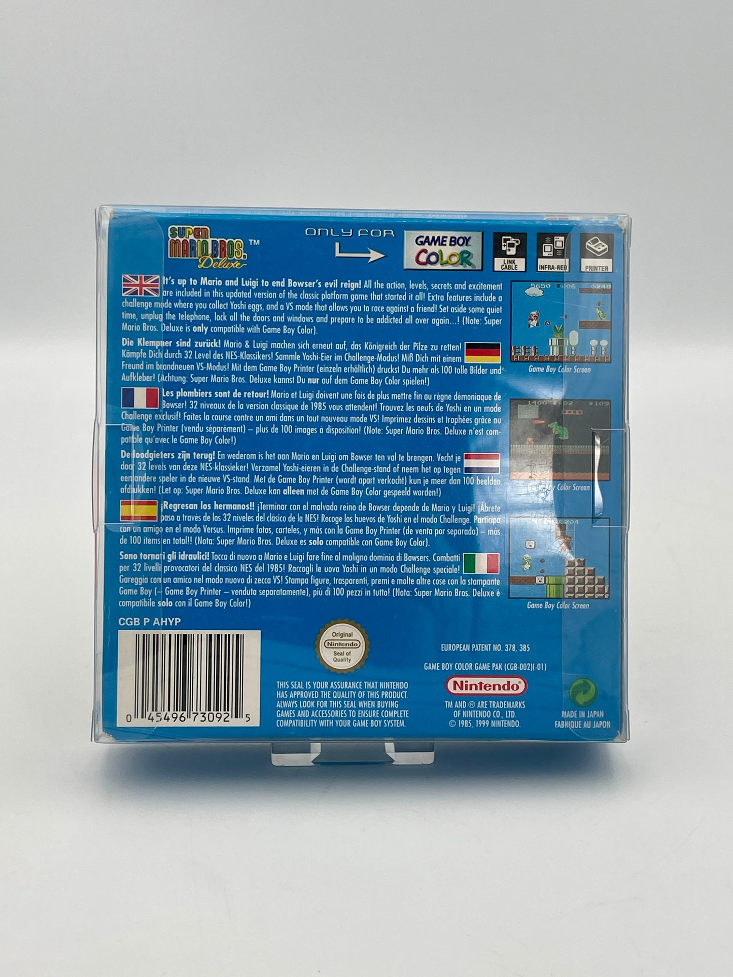 Back view of a Game Boy Color game case with text and logos on a gray background