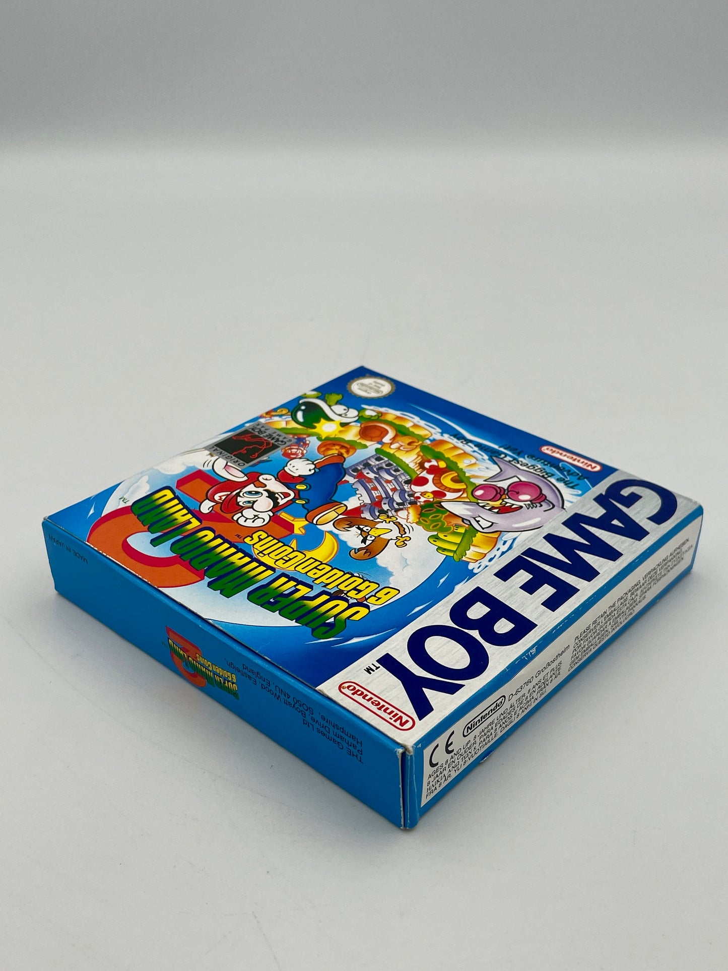 Game Boy packaging with colorful graphics on a gray background