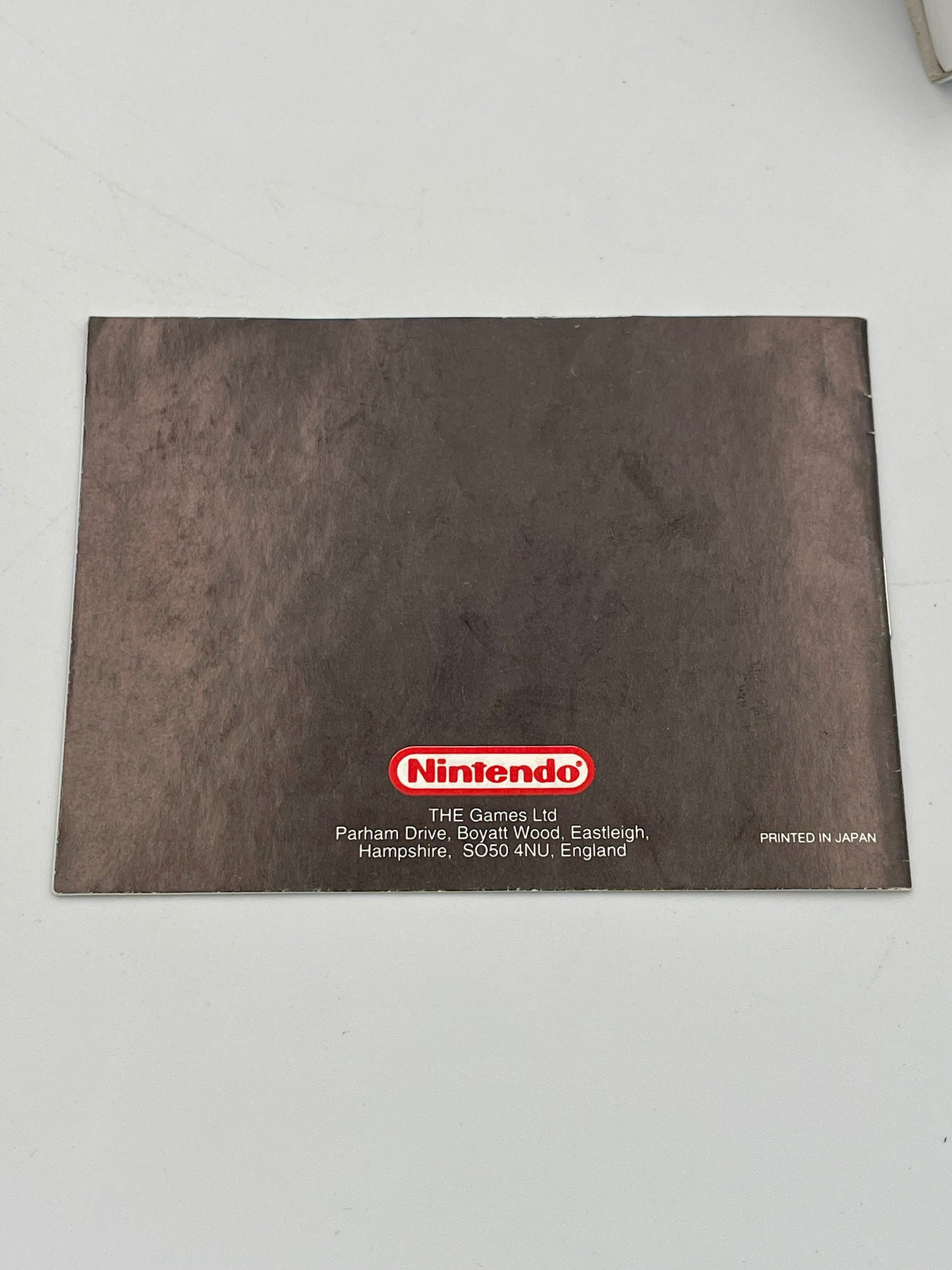Nintendo branded brown cardboard box on a white background