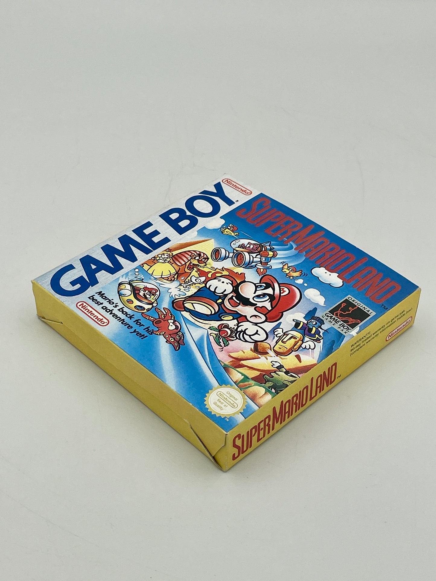 Nintendo Game Boy packaging featuring Super Mario Land on a gray background
