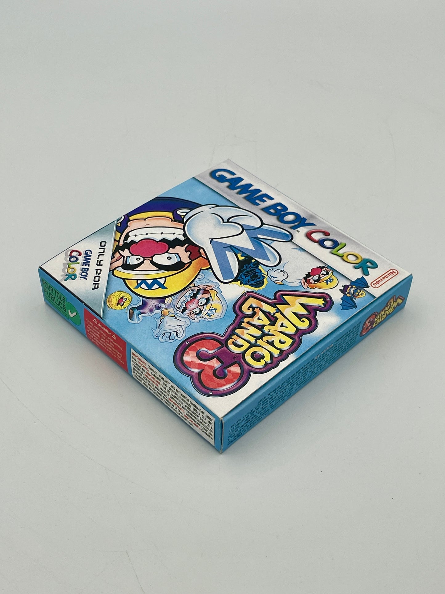 Game Boy Color game case with cartoon characters on a gray background