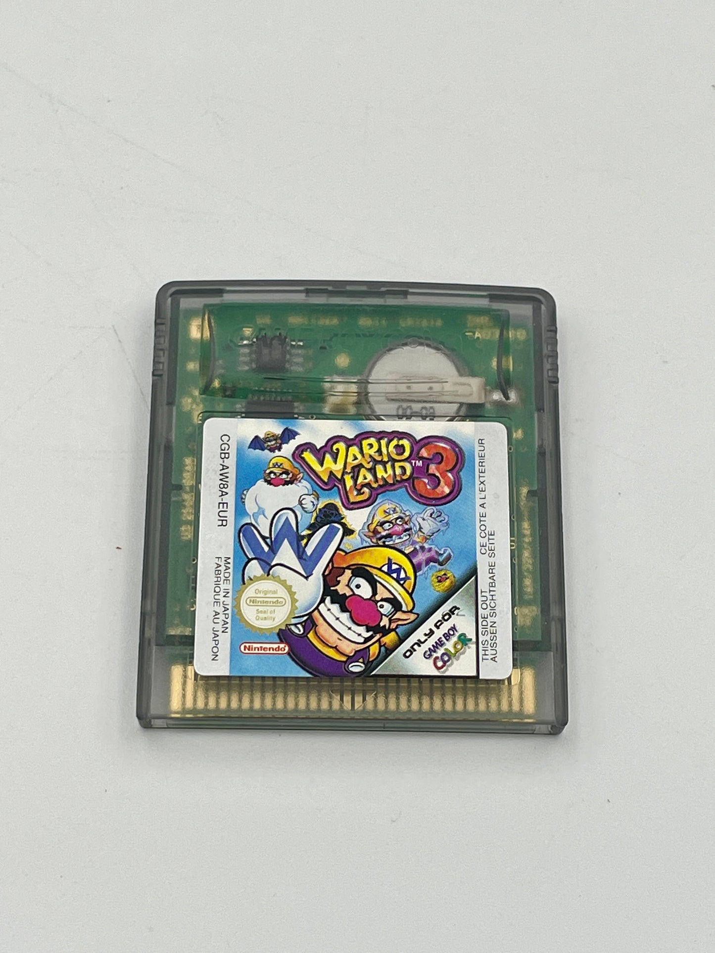 Wario Land 3 game cartridge on a white background