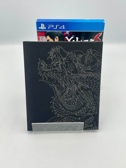 Black book with dragon design on a white background
