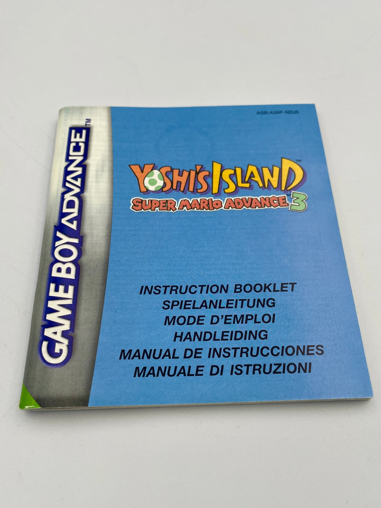 Instruction booklet for 'Yoshi's Island' Super Mario Advance 3 on Game Boy Advance with blue cover and Game Boy Advance logo.