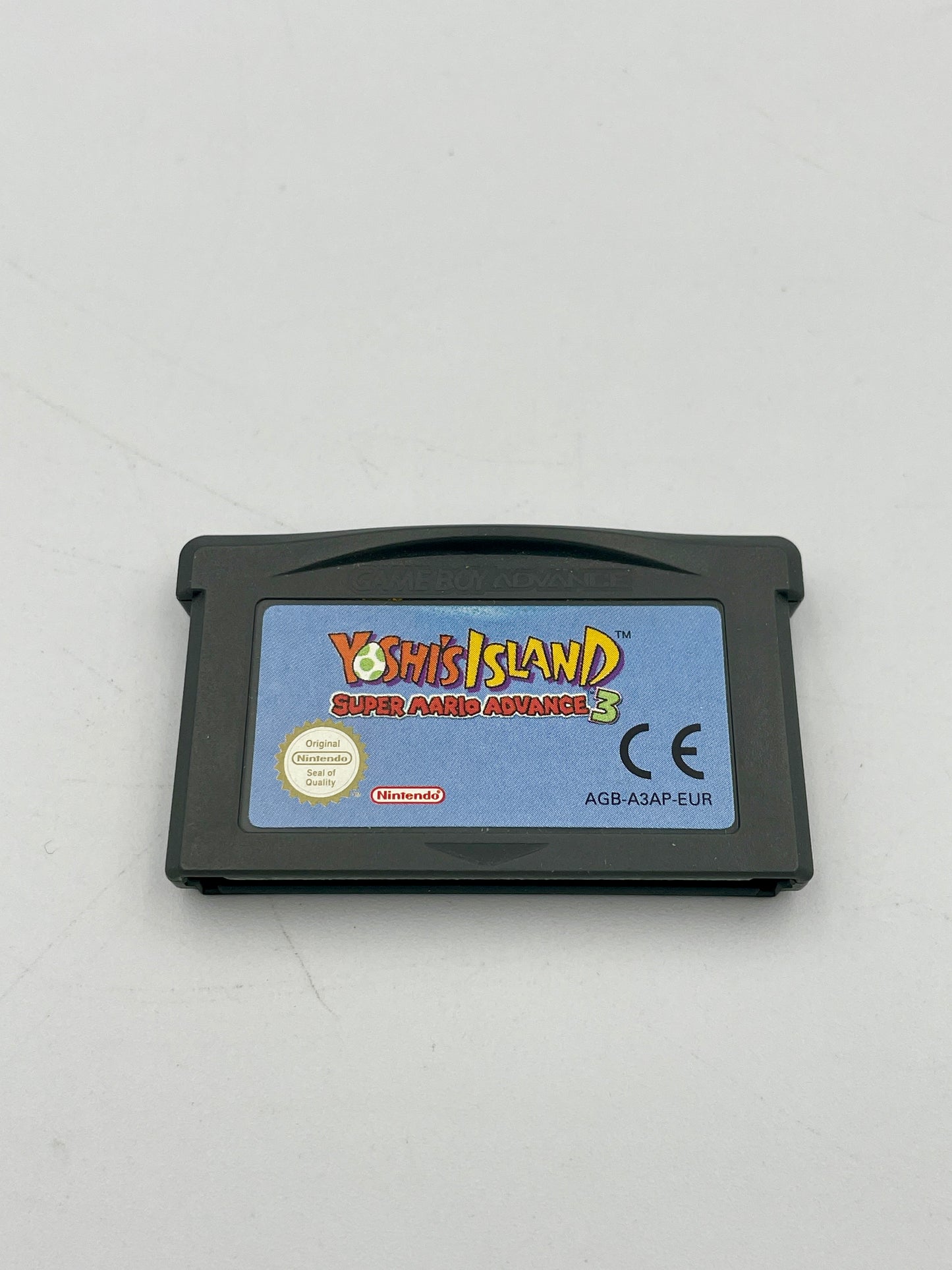 Game cartridge for 'Yoshi's Island' on a white background