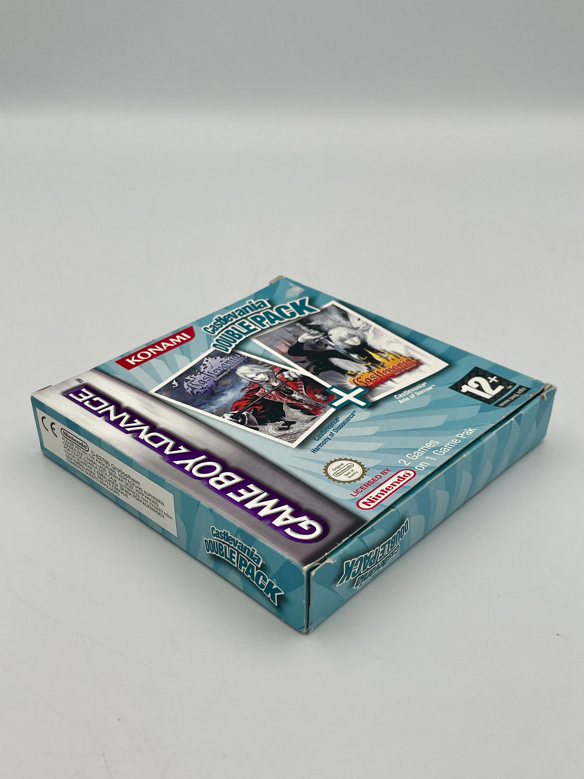 Game Boy Advance packaging with images of games on a gray background