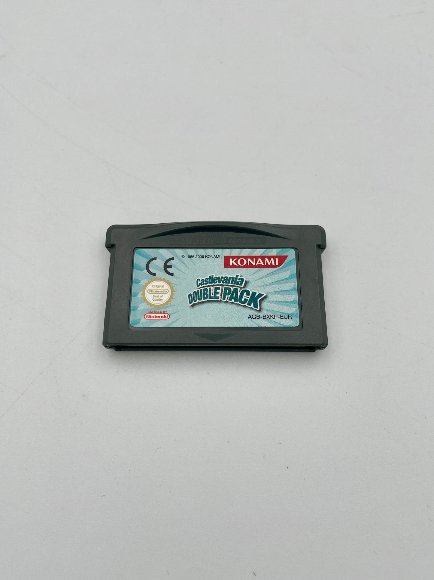 Game cartridge with Konami branding on a gray background