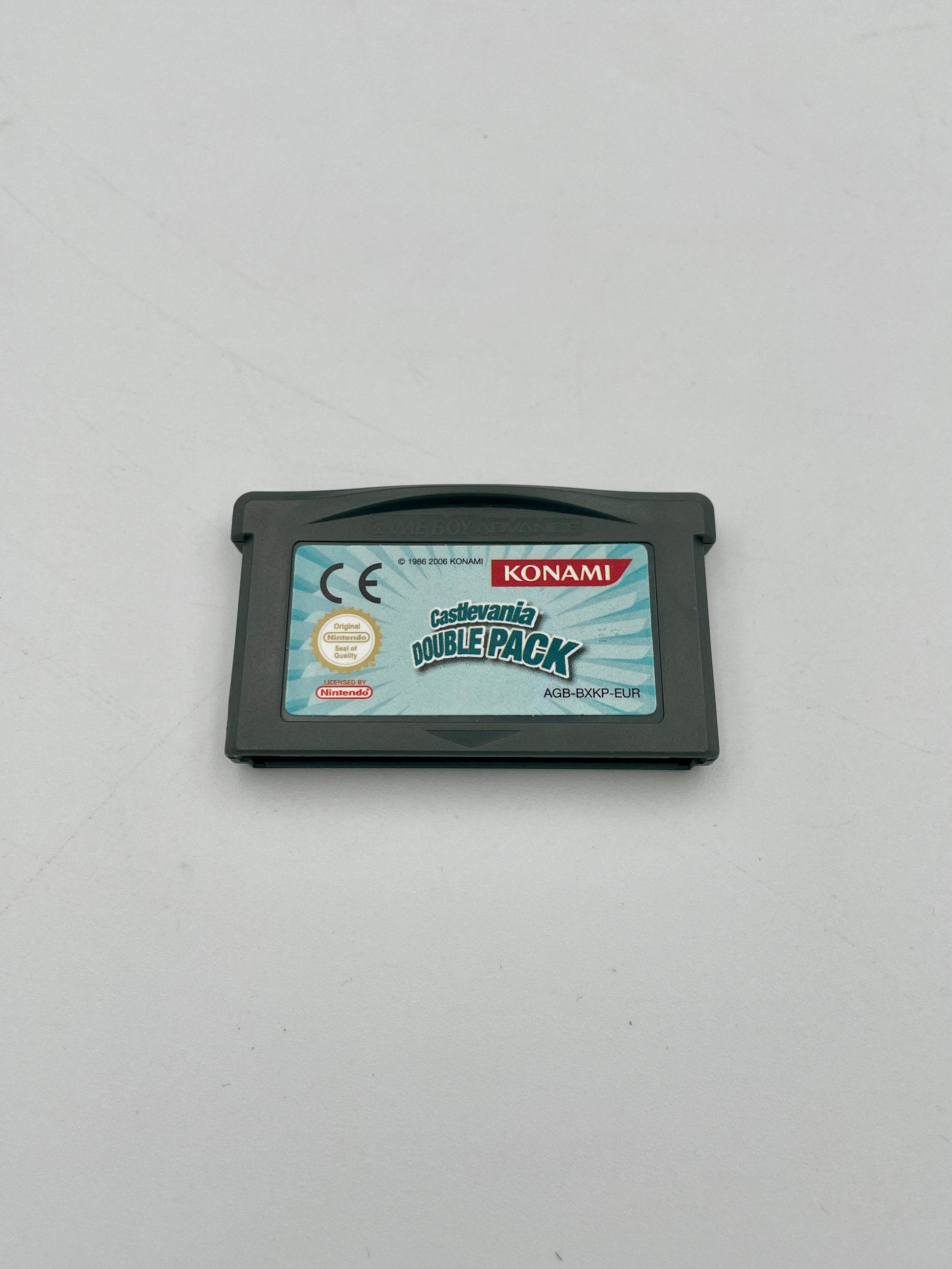 Game cartridge with Konami branding on a gray background