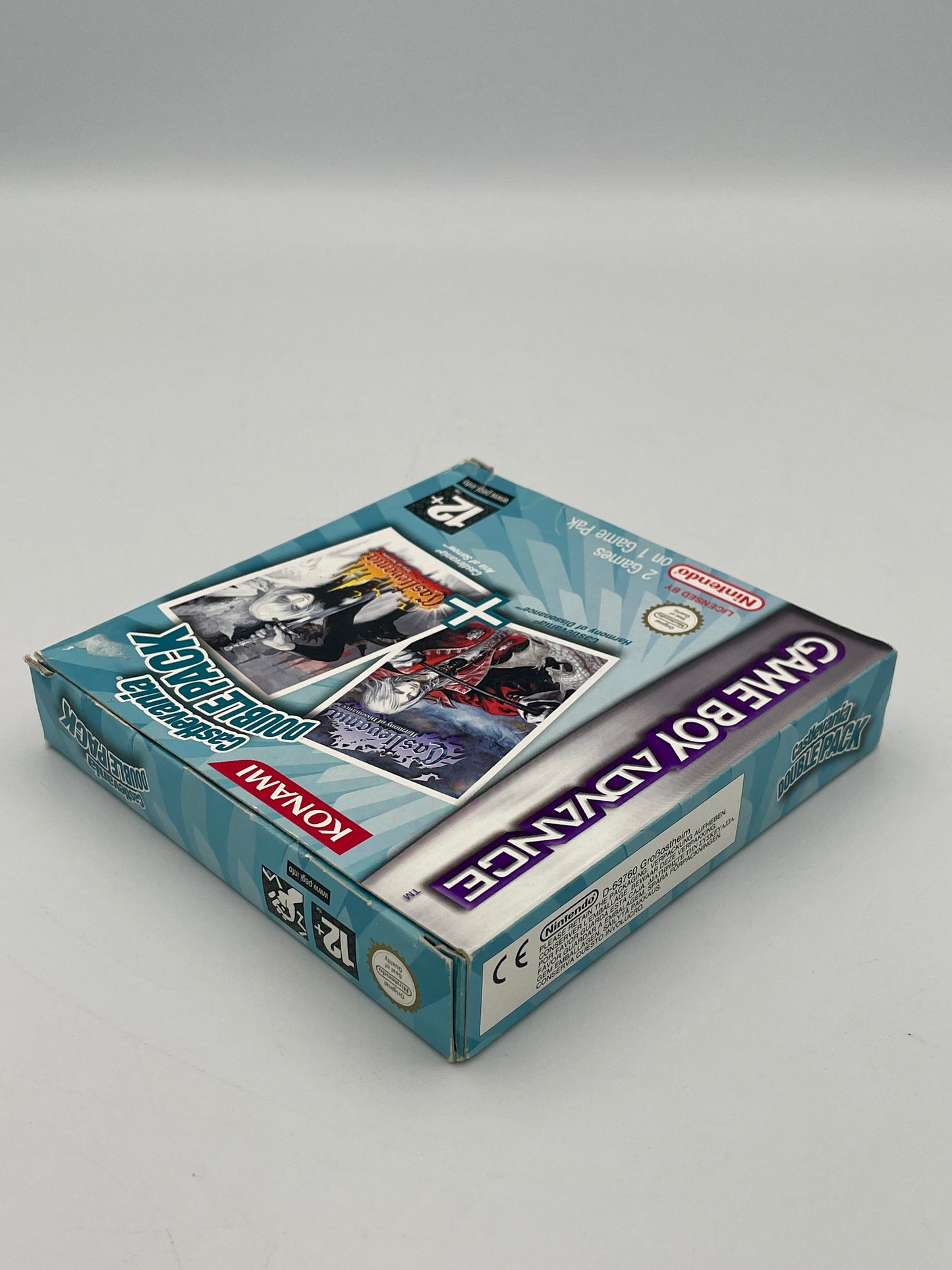Game Boy Advance game case with 'Donkey Kong Country' on a gray background