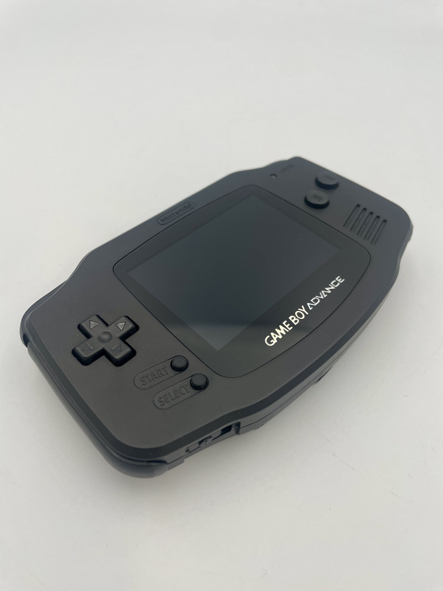 Black Game Boy Advance on a white background