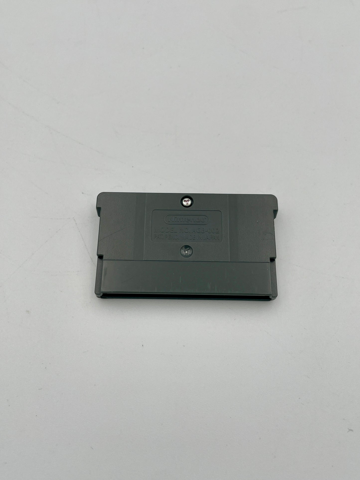 Black rectangular object on a gray background