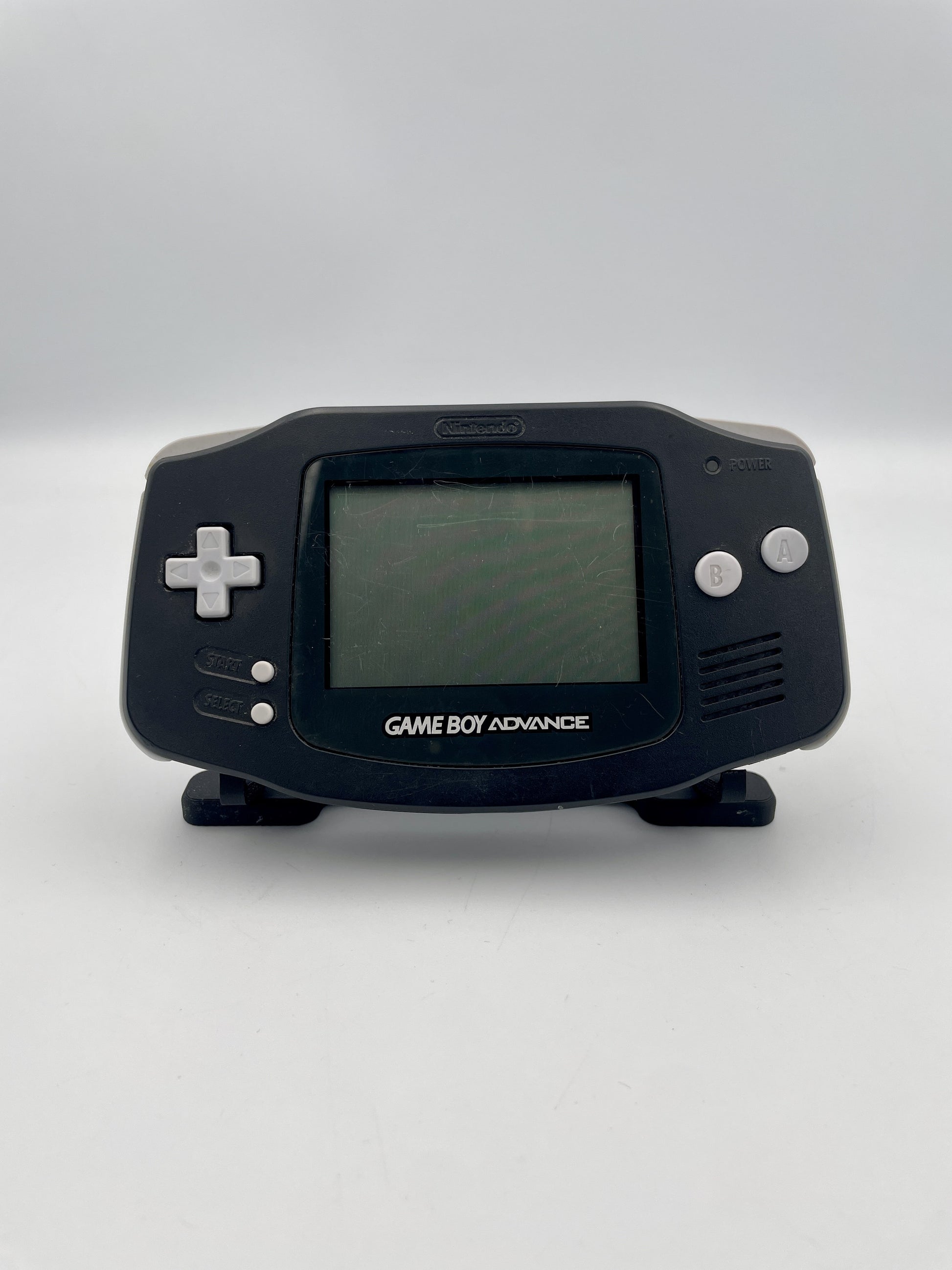Black Game Boy Advance on a white background