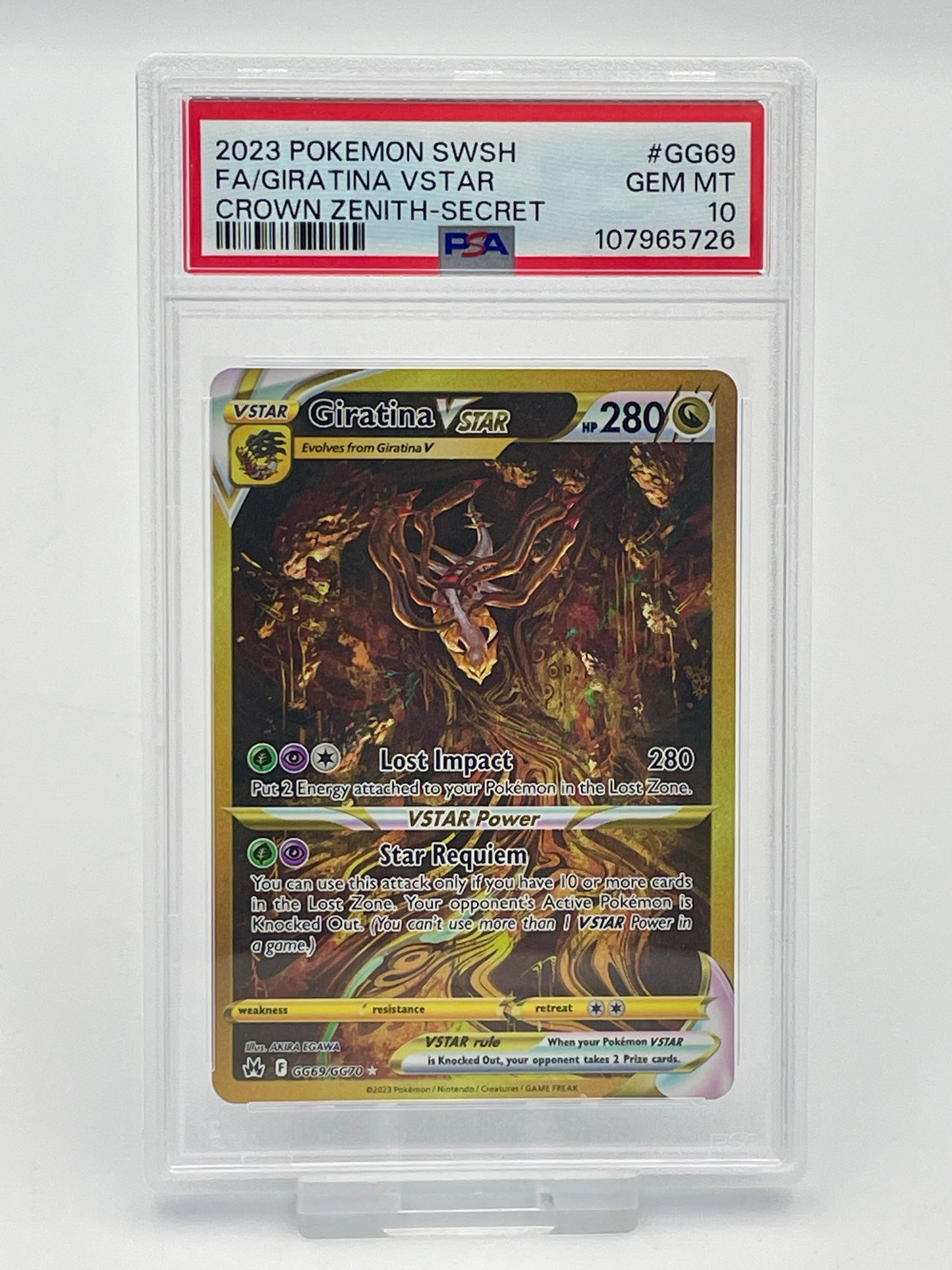 Pokémon trading card giratina vstar in a protective PSA graded case in a PSA 10