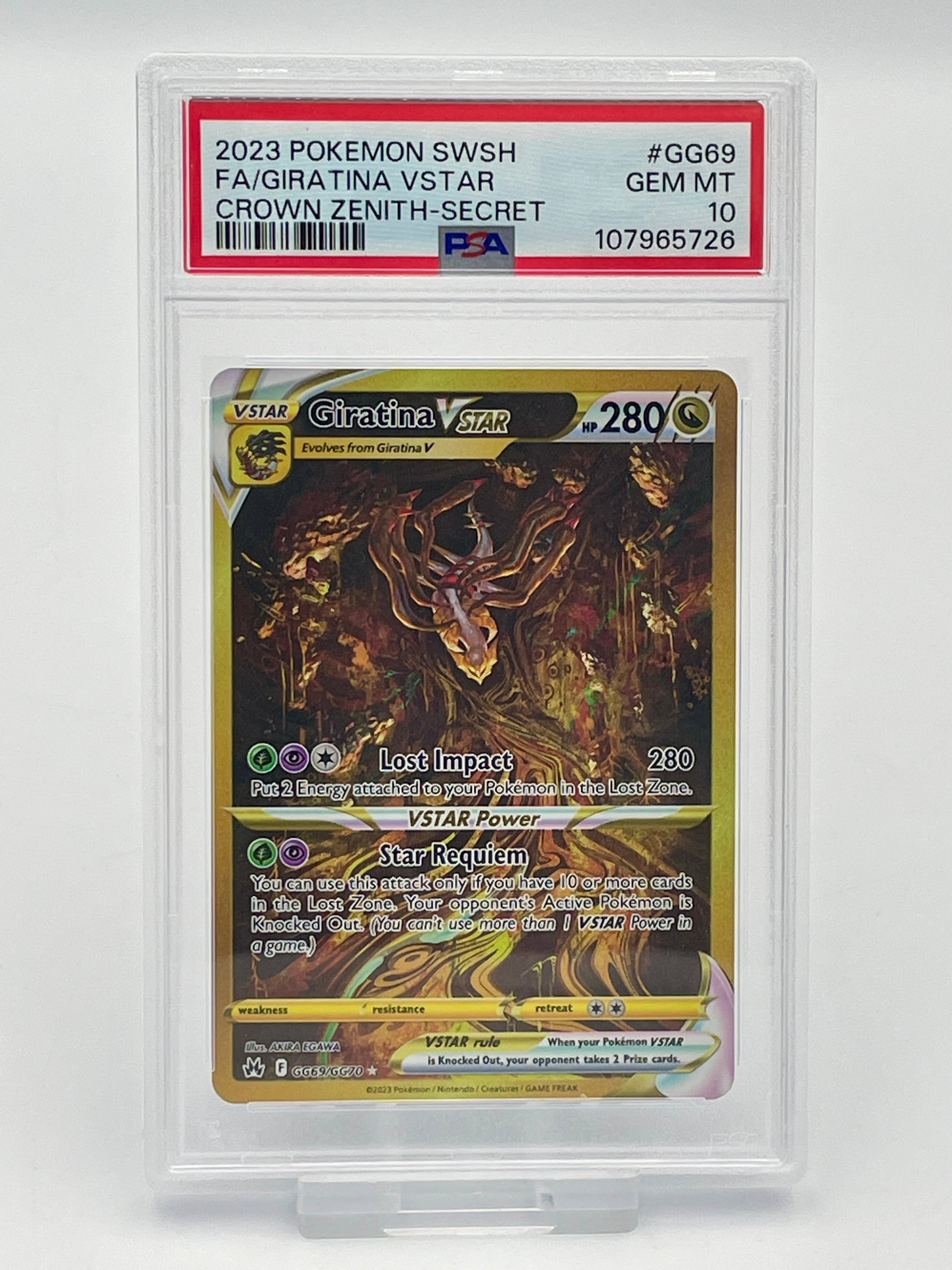 Pokémon trading card giratina vstar in a protective PSA graded case in a PSA 10