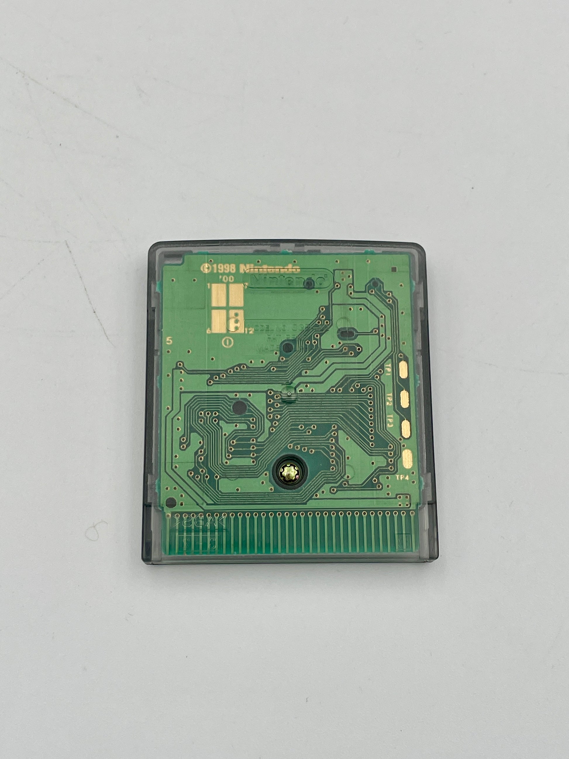 Green circuit board on a gray background