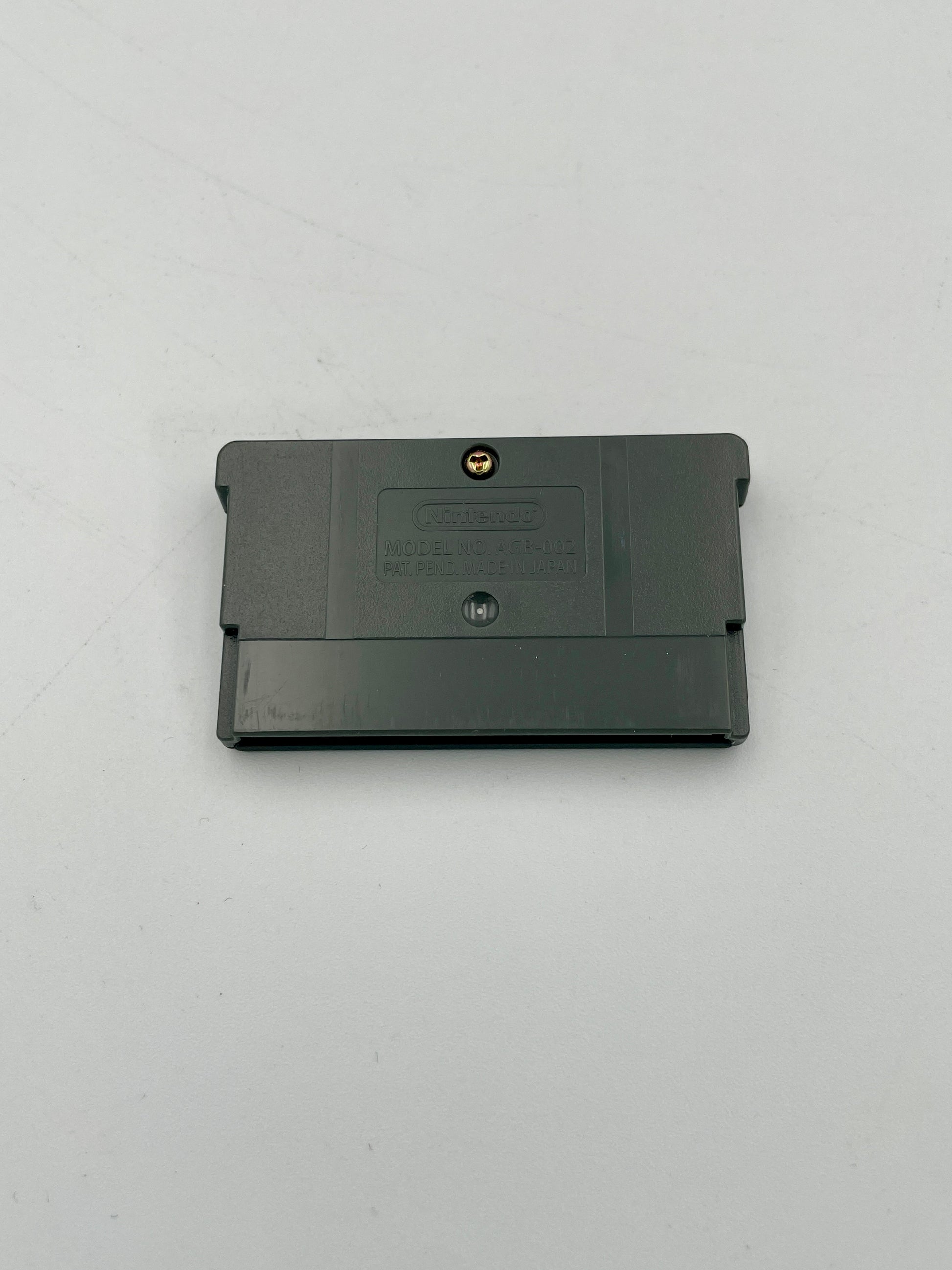 Black cartridge on a light gray background