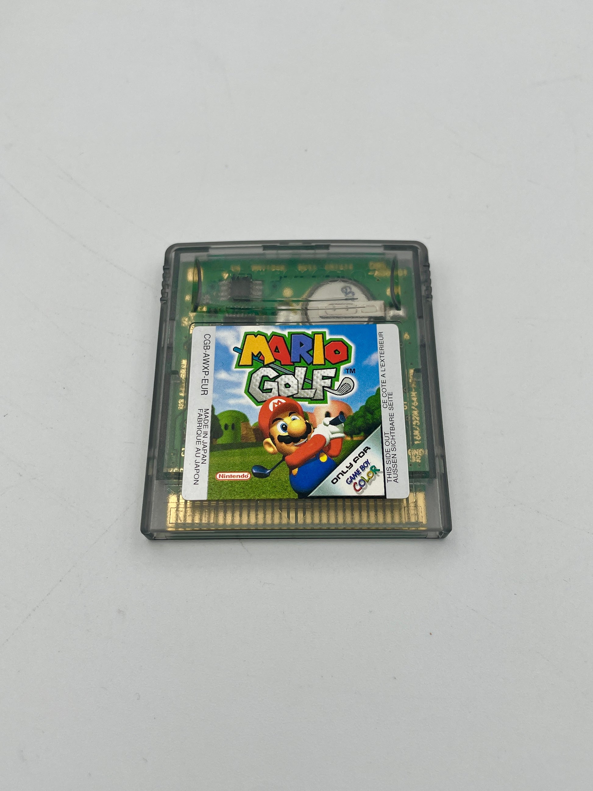 Game cartridge for 'Mario Golf' on a gray background