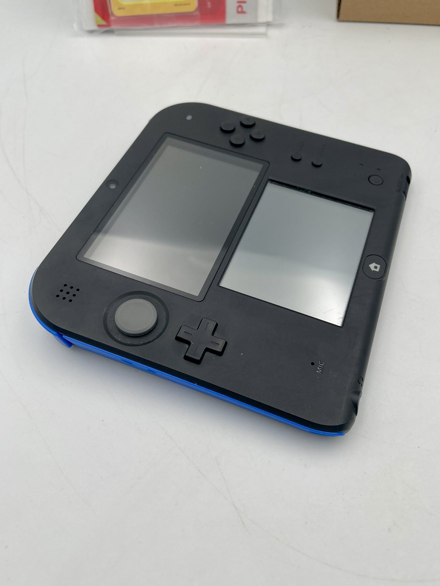 Nintendo 2DS Console Mario Kart 7 Edition Complete in Box – boxed Nintendo 2DS handheld bundle (stylus missing; game may not be pre-installed).