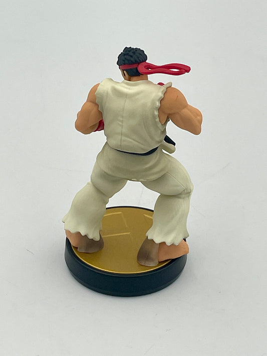 Action figure of a character in a fighting pose on a white background