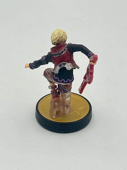 Figurine on a round base with a white background