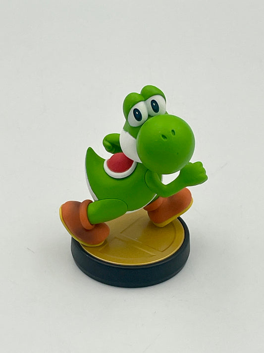 Green dinosaur-like figure with orange shoes on a white background