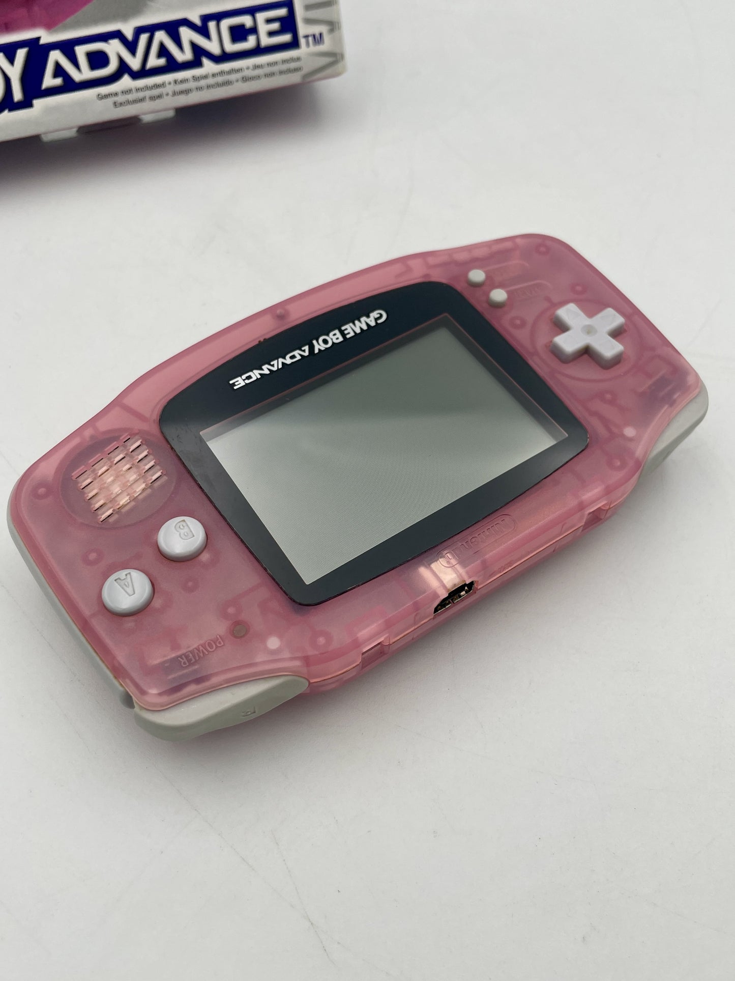 Pink Game Boy Advance console on a white background