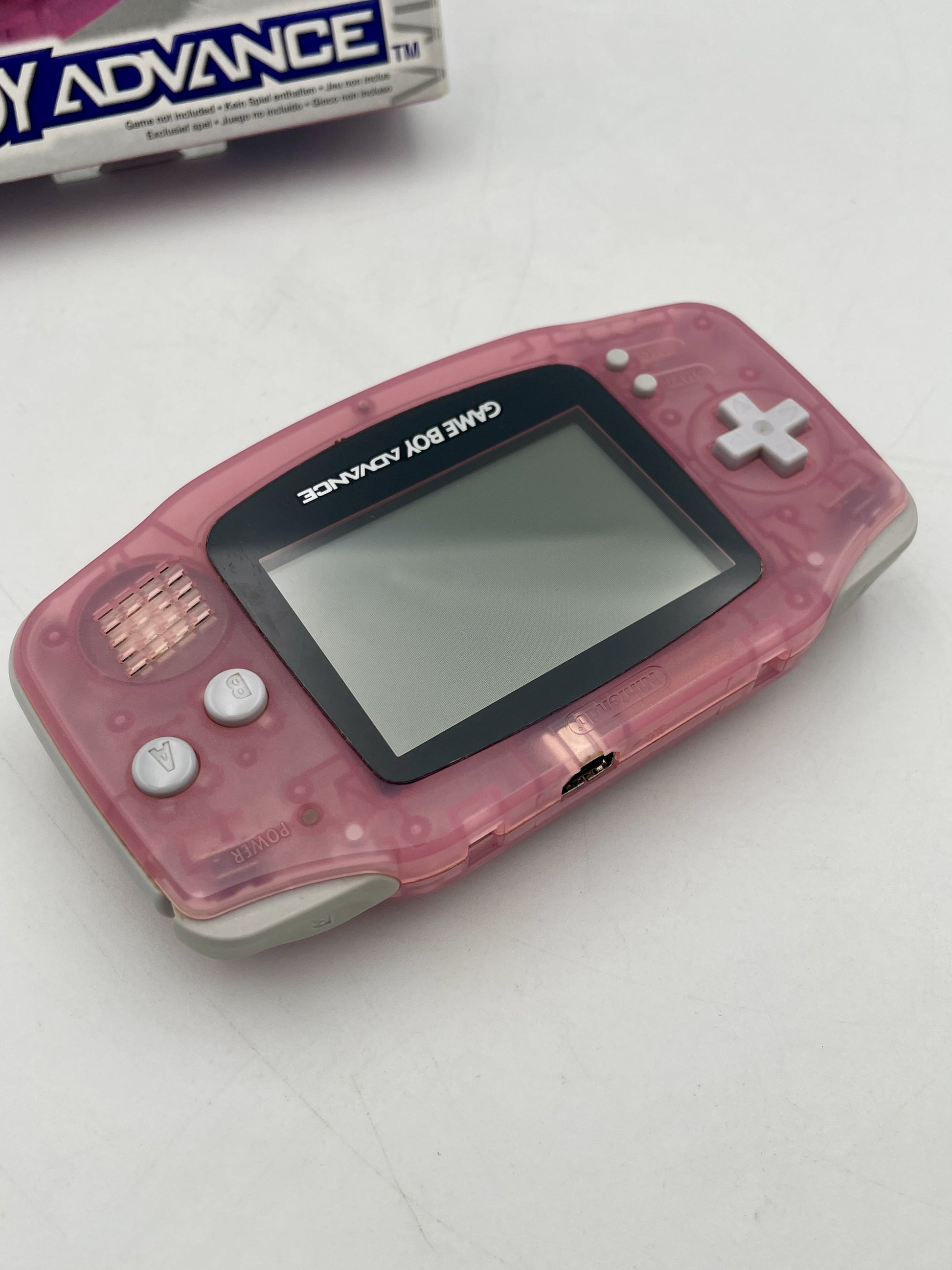 Pink Game Boy Advance console on a white background
