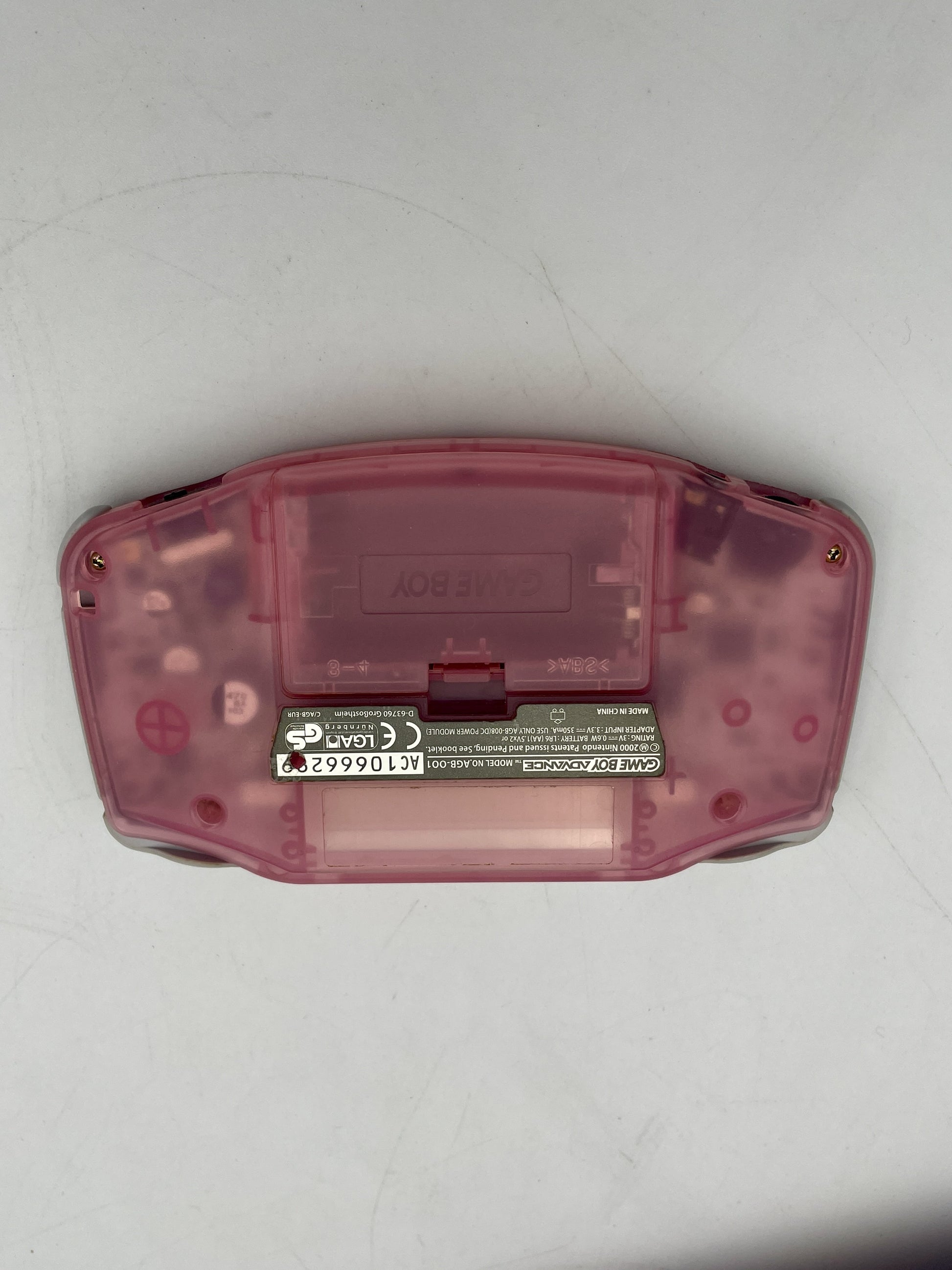 Pink Game Boy Advance shell on a white background