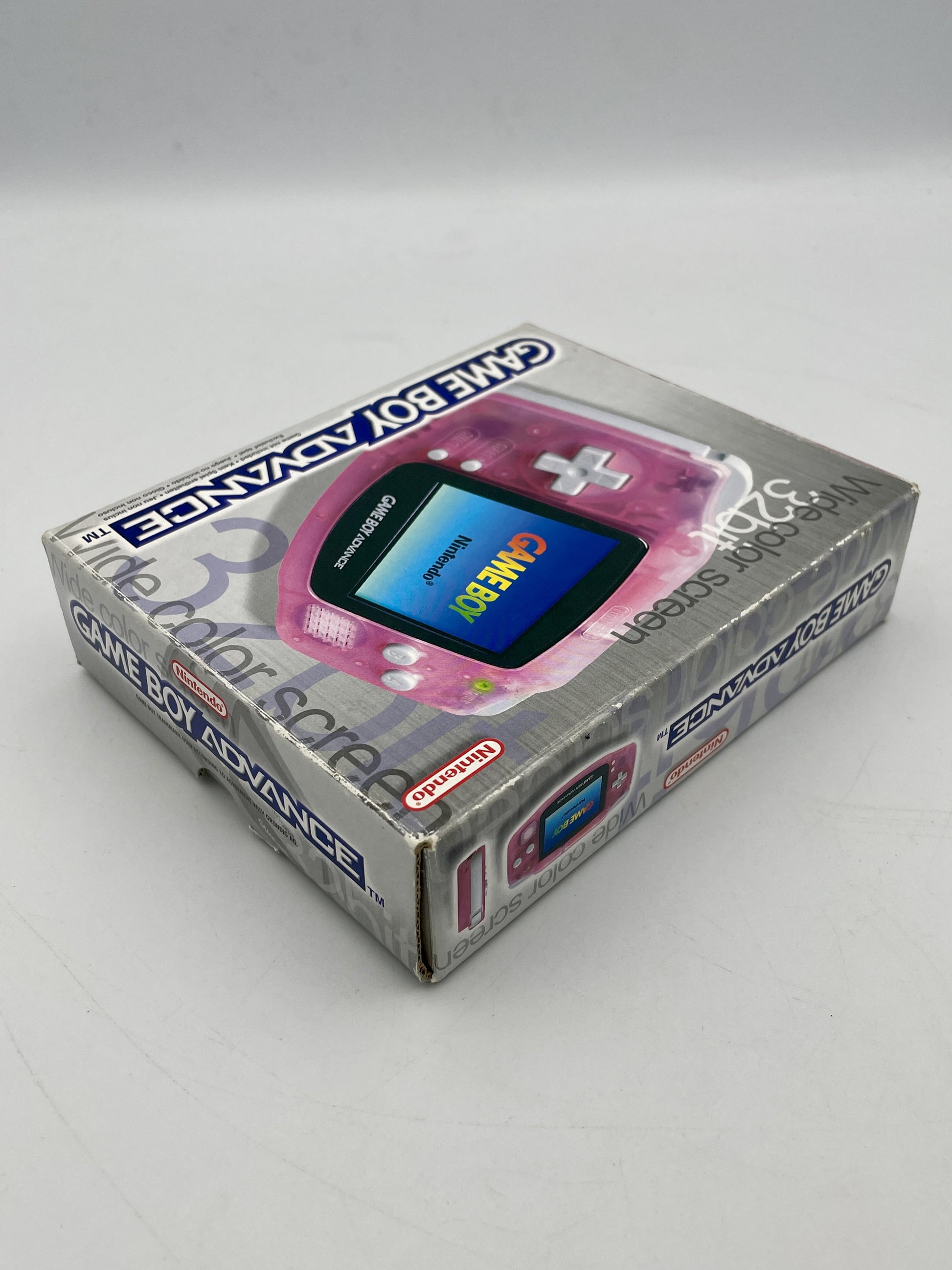 Pink Game Boy Advance console packaging on a white background