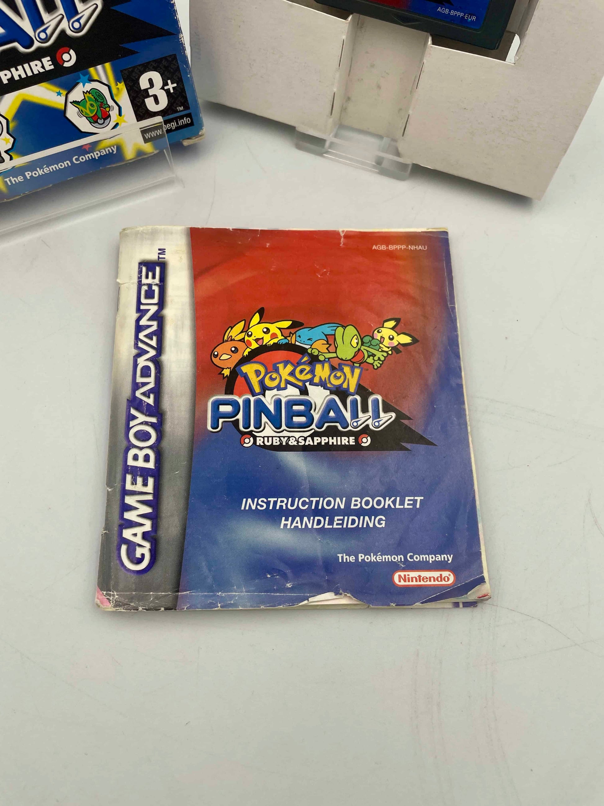 Pokémon Game Boy Advance Pinball instruction booklet on a white surface