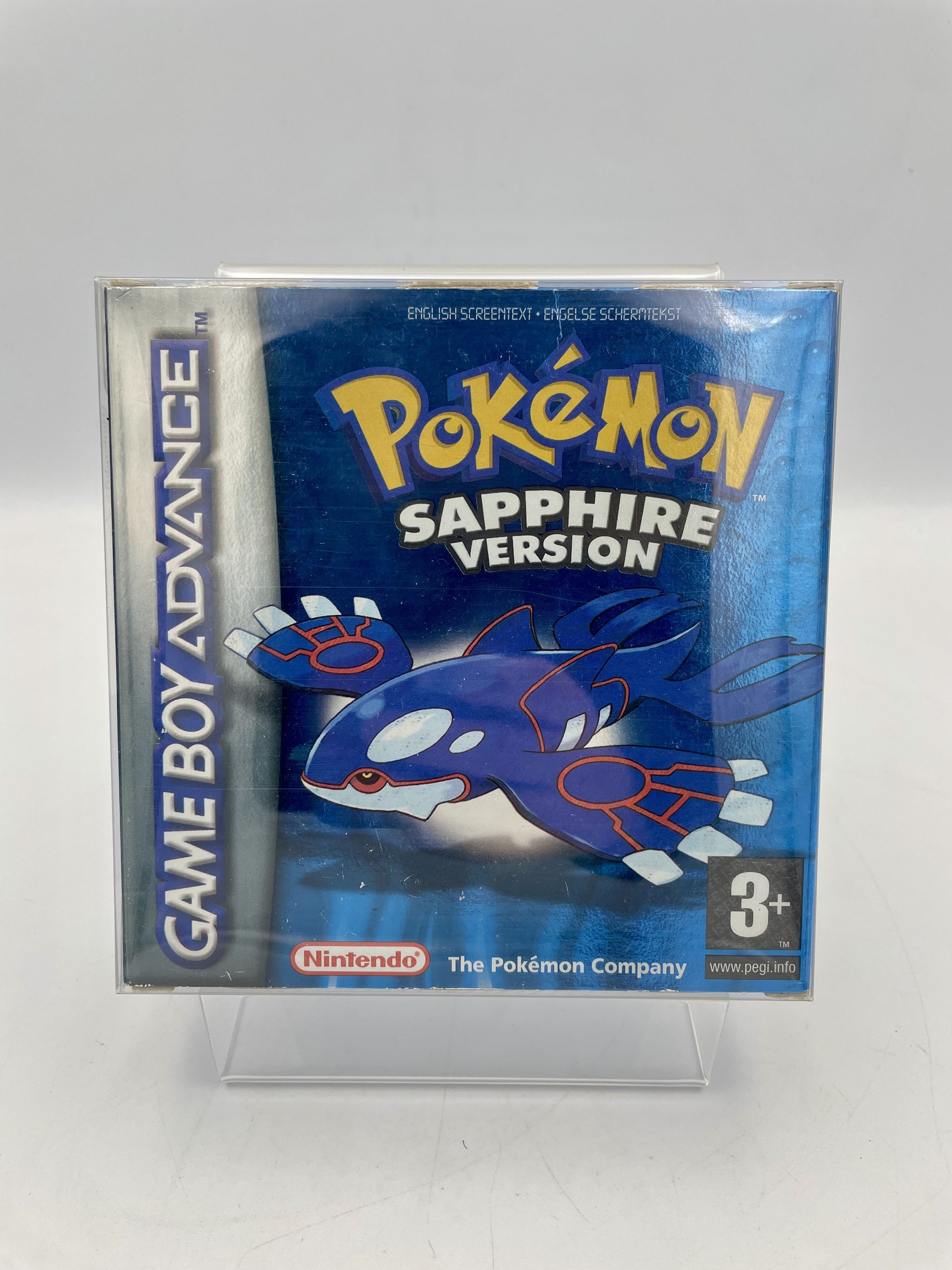 Pokémon Sapphire Version Game Boy Advance packaging on a stand