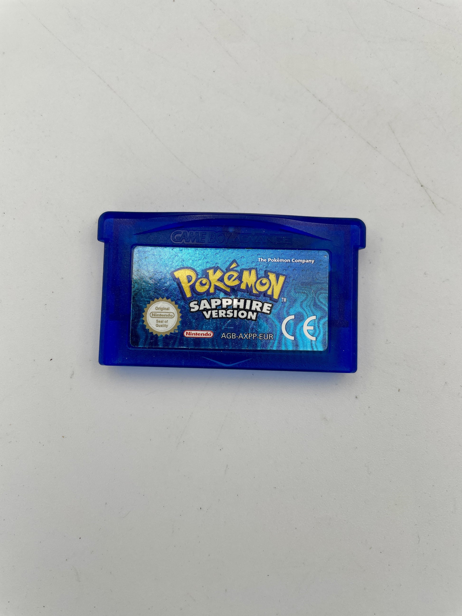 Pokémon Sapphire Version game cartridge on a white background