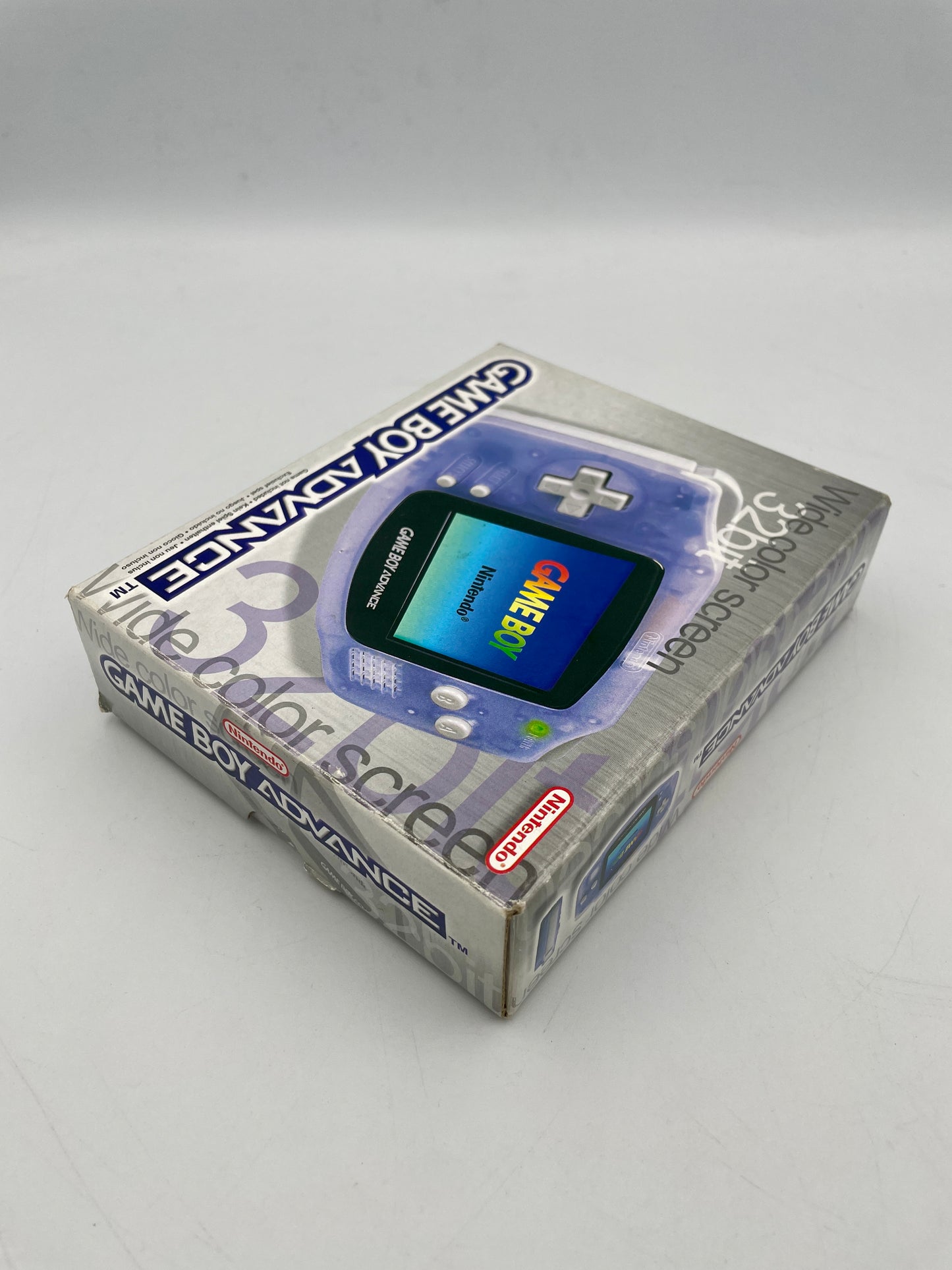 Box of Game Boy Advance with screen replacement label on a gray background