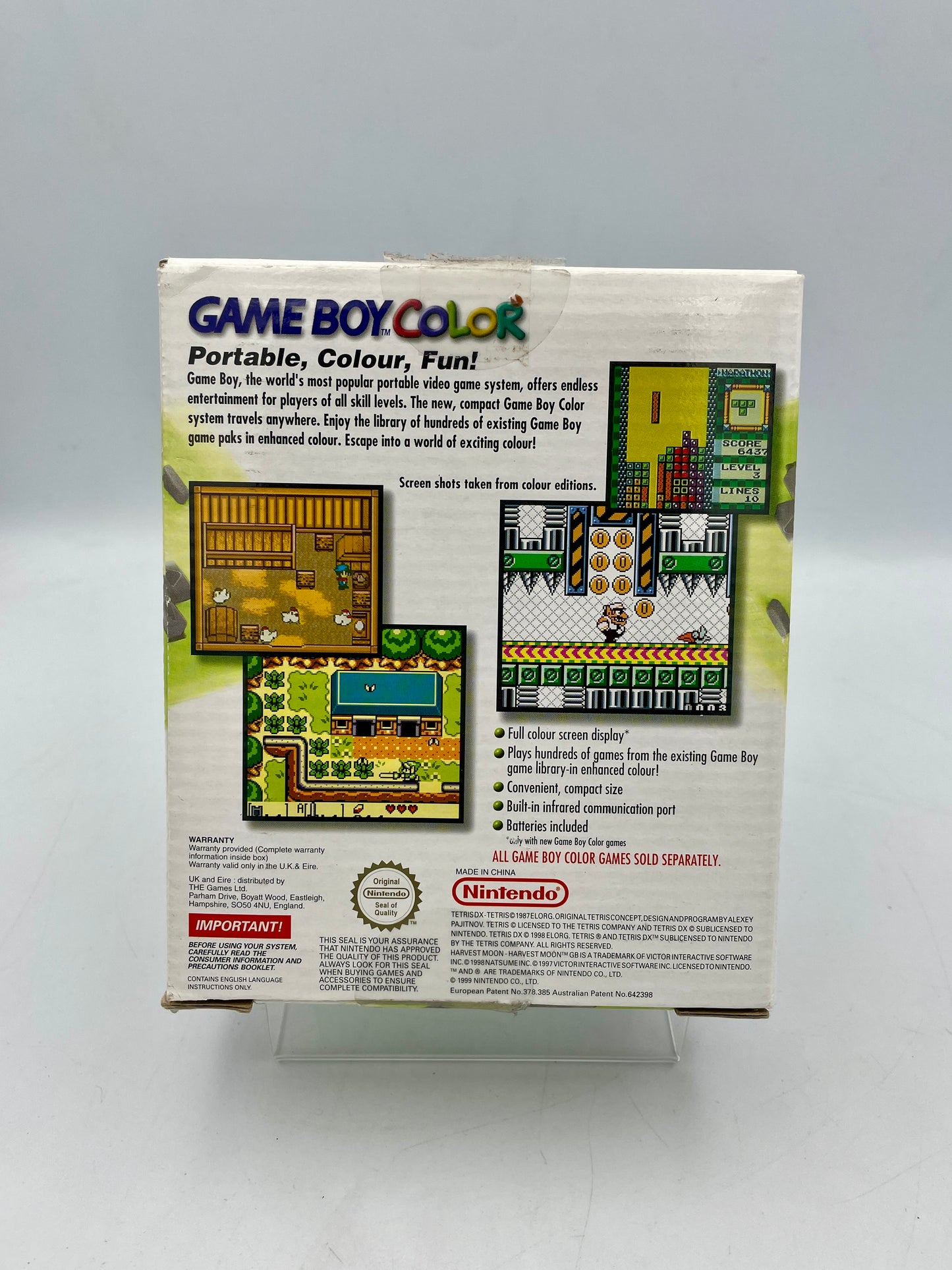 Back view of a Game Boy Color packaging with text and graphics on a white background