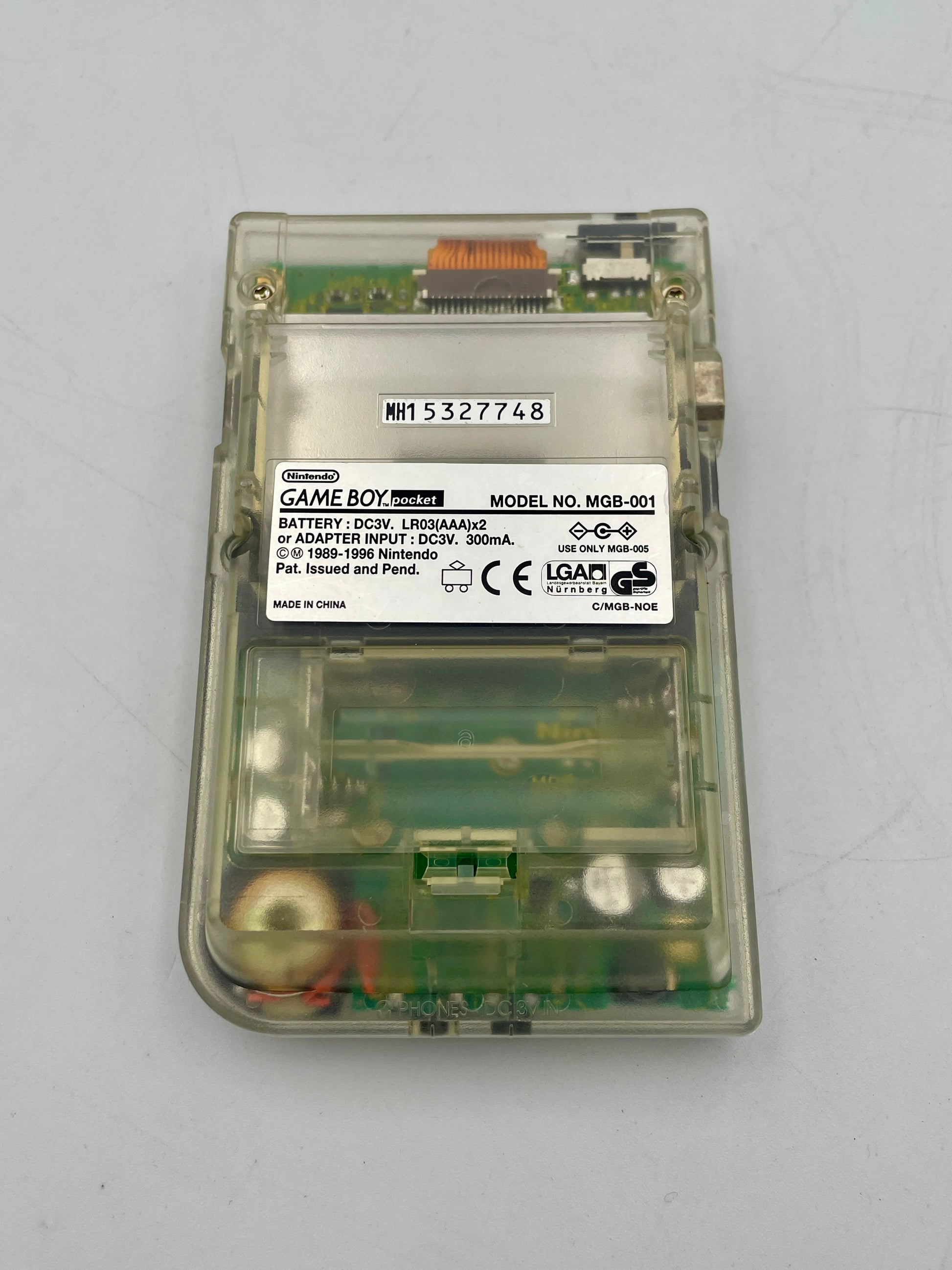 Clear Game Boy cartridge on a gray background