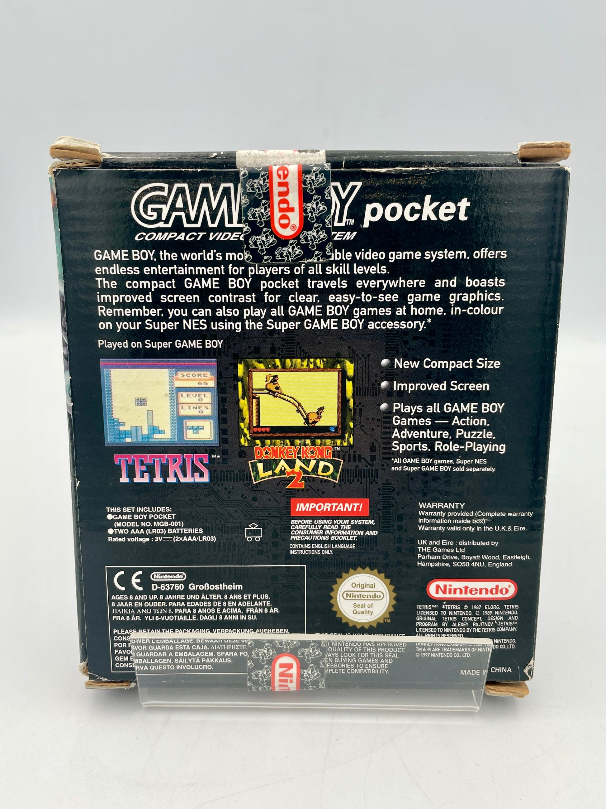 Back of a Game Boy Pocket packaging with text and graphics on a gray background