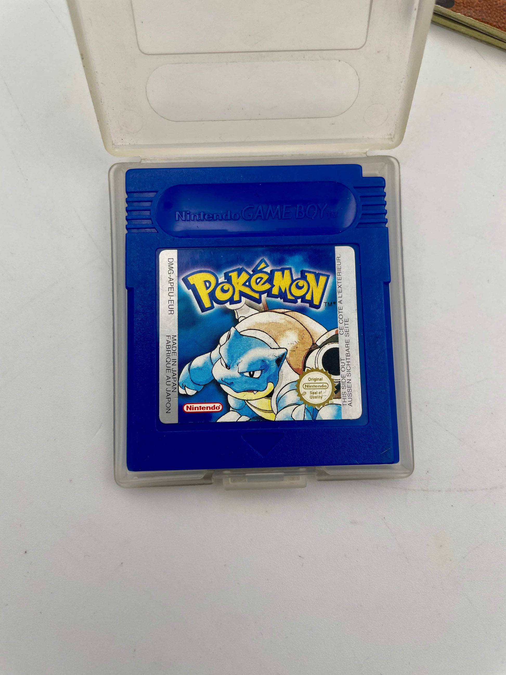 Blue Game Boy cartridge with a Pokémon logo on a white background
