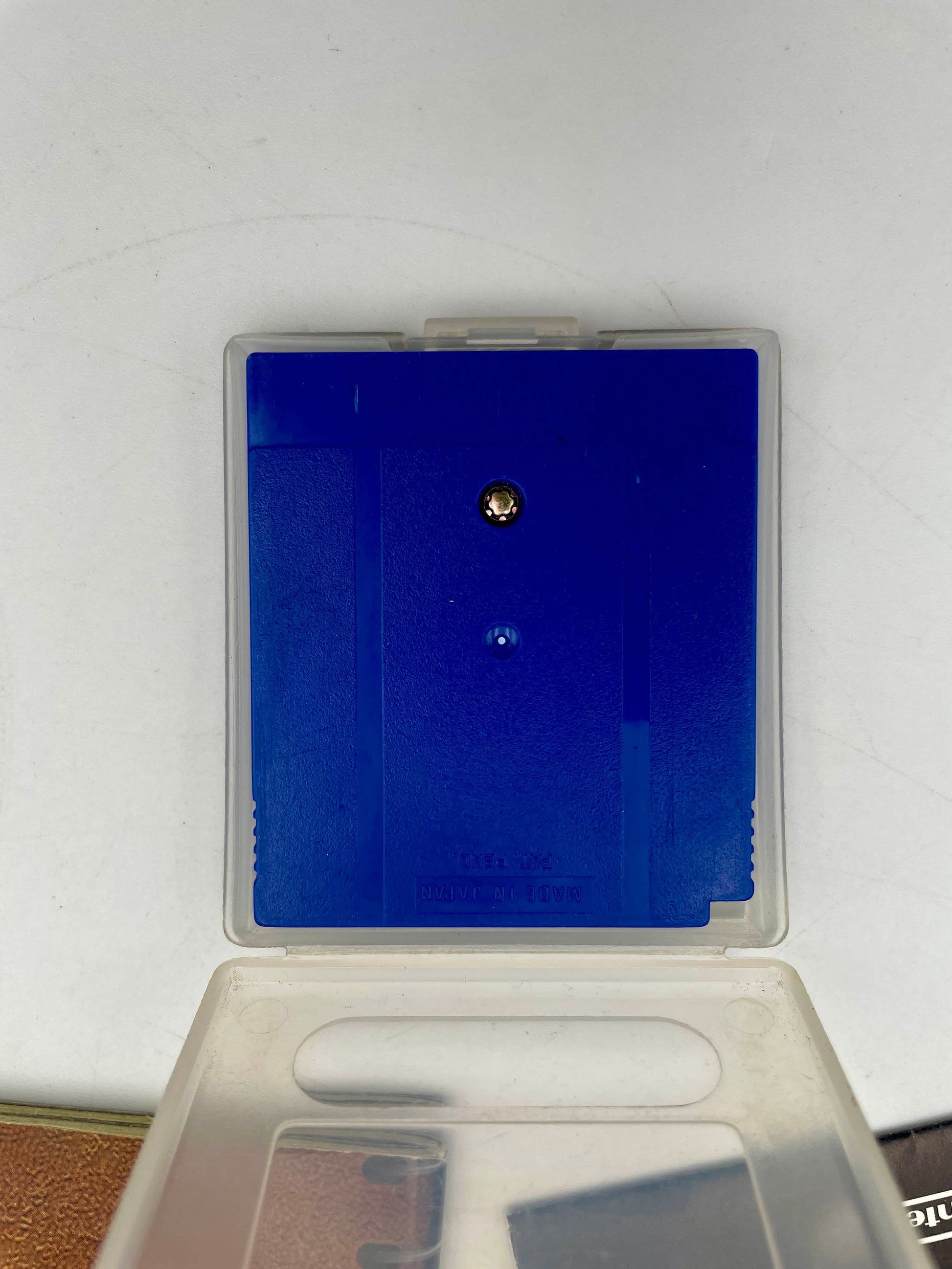 Clear plastic case with blue interior on a white background