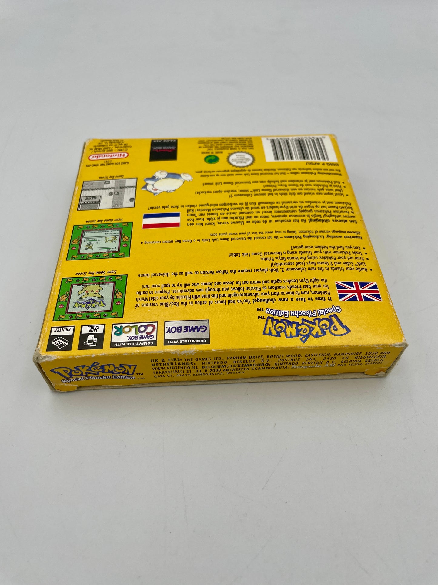 Back view of a yellow Pokémon trading card game box on a white background